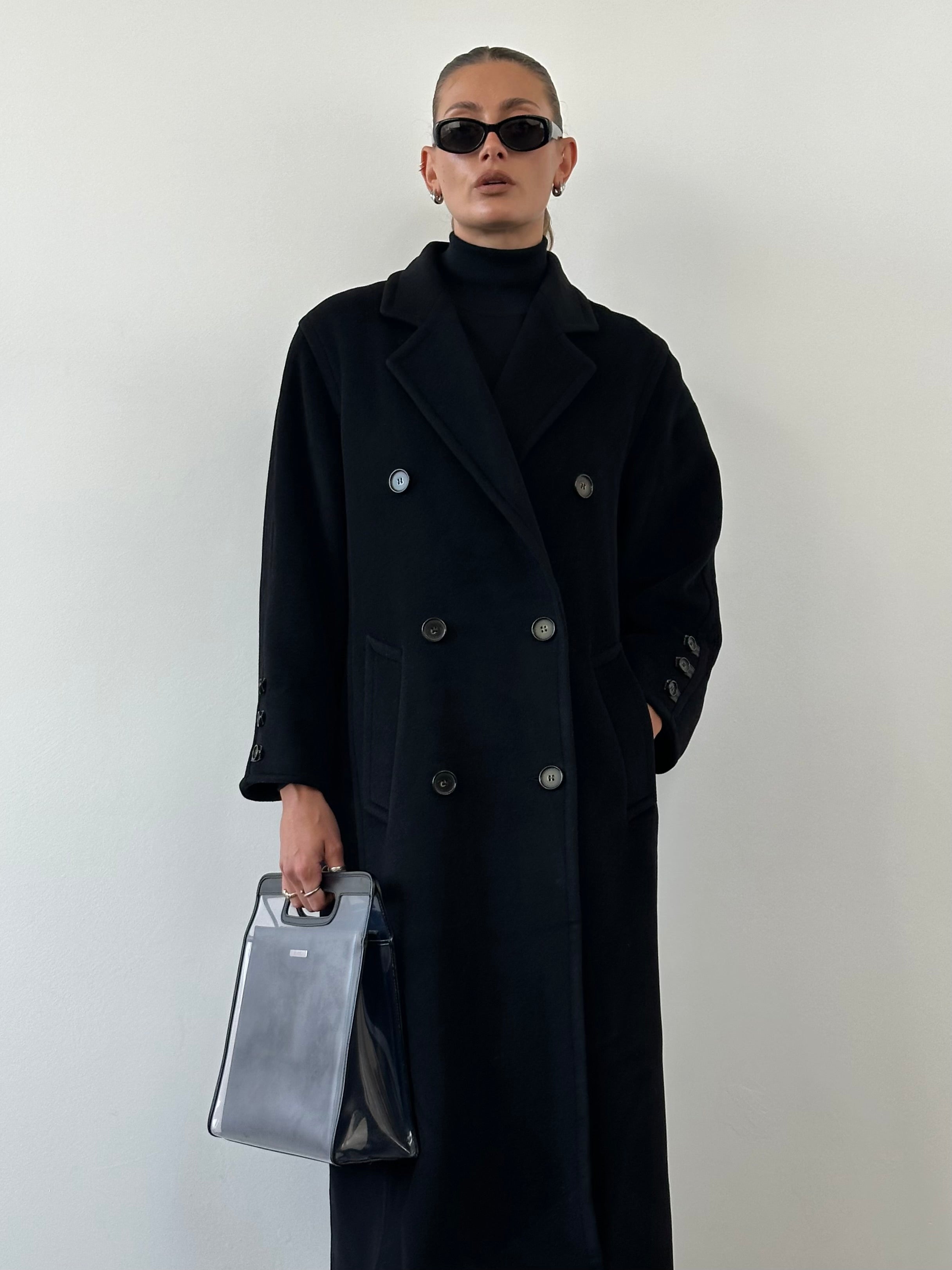 Vintage wool and cashmere double-breasted coat in size M/L, showcasing classic design and textured fabric.