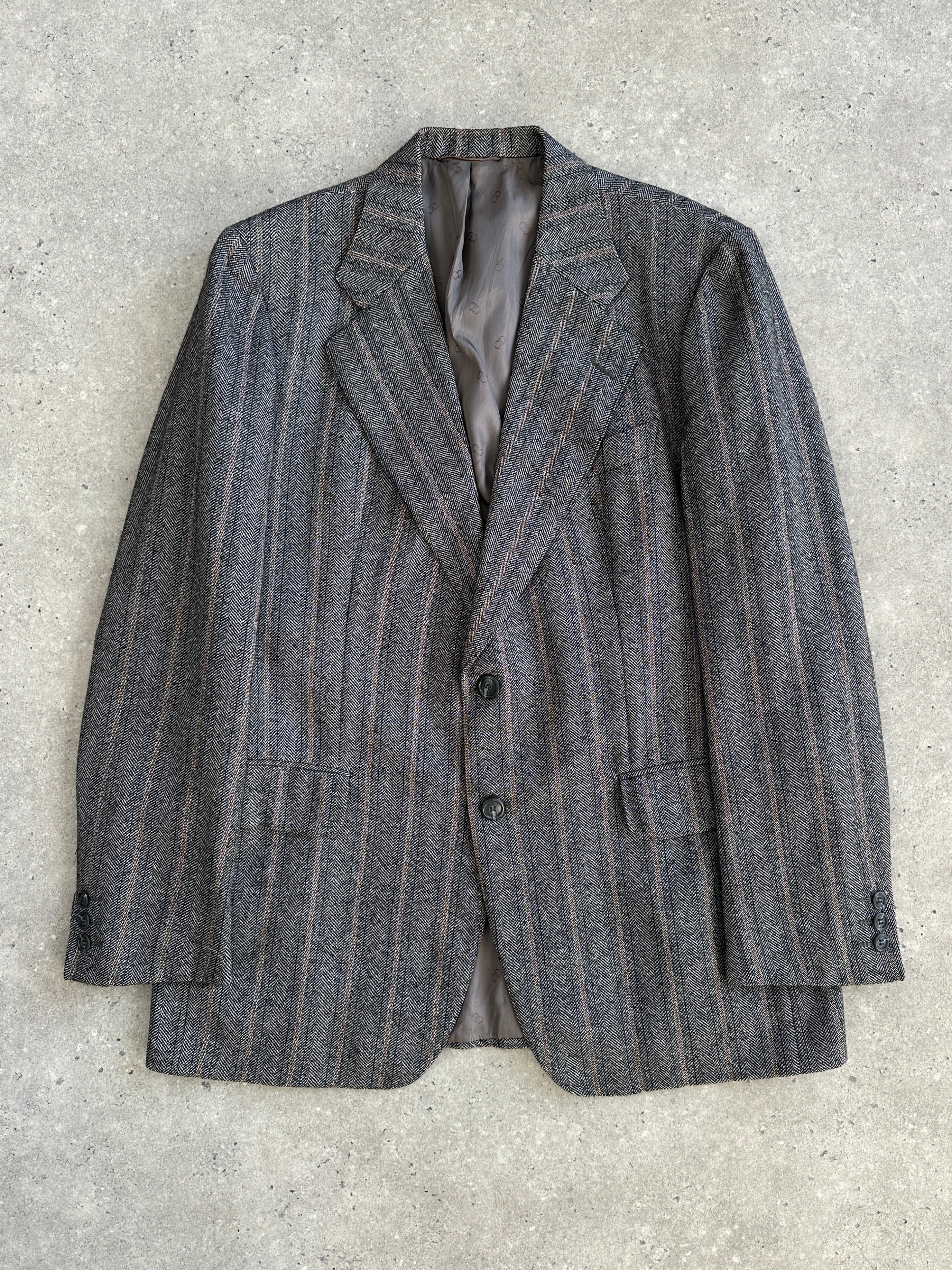 Christian Dior Monsieur 1980s pure wool tweed herringbone blazer, 42R/XL, with classic tailored fit and textured fabric details.