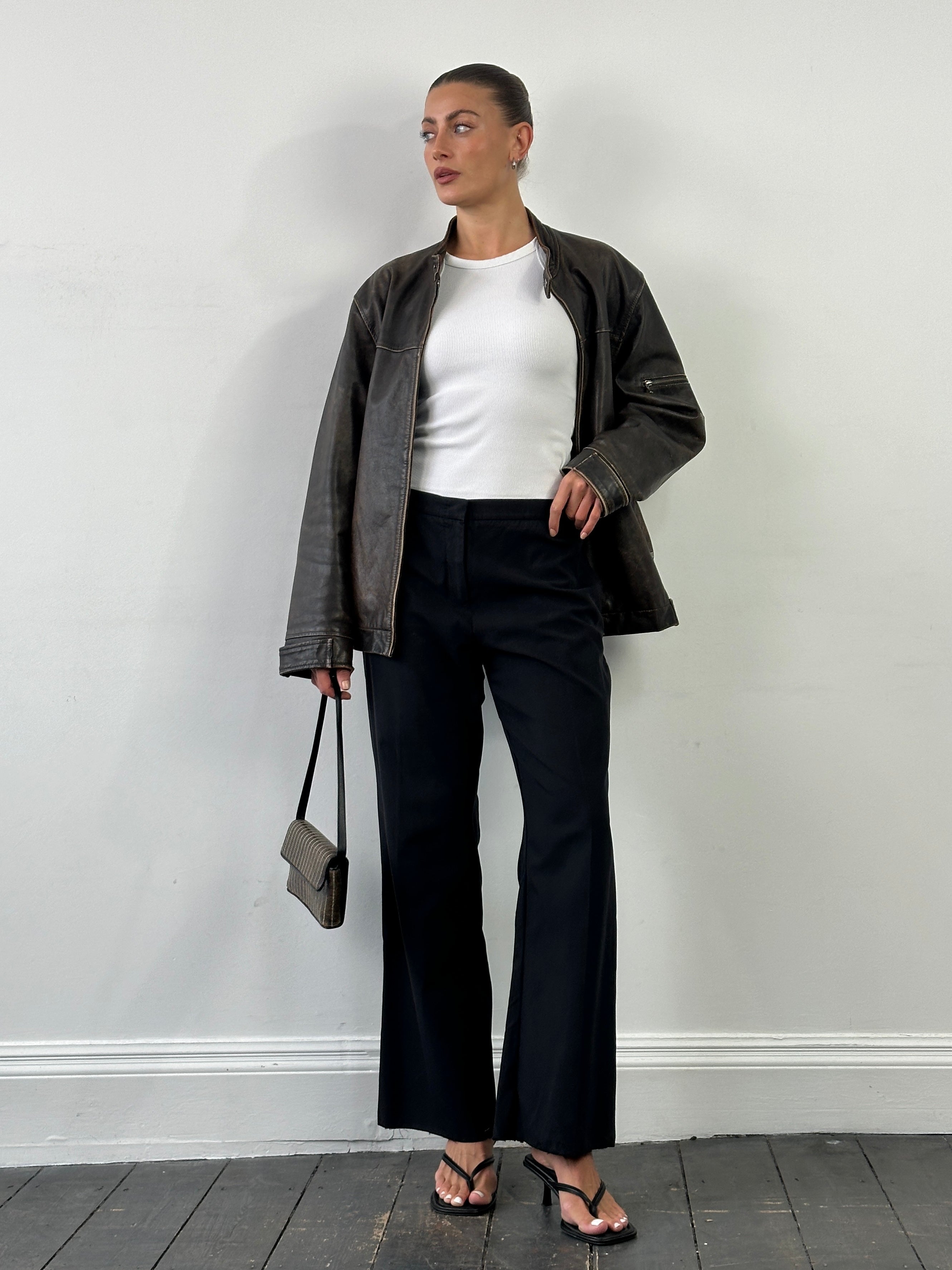 Max Mara cotton silk mid-waisted straight leg trousers in beige, displayed on a hanger with a neutral background.
