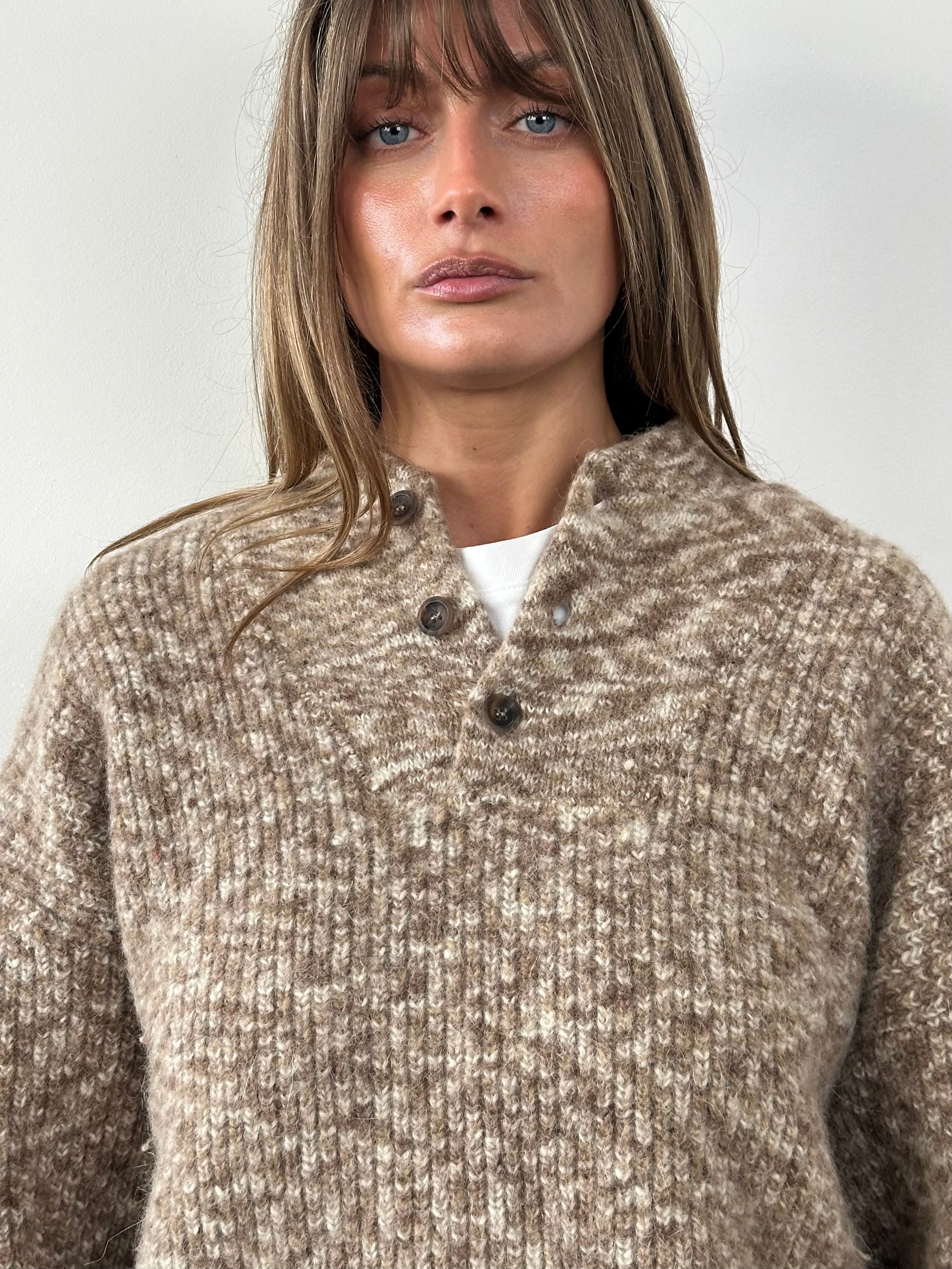 CP Company wool alpaca knitted jumper in size L, featuring a cozy, chunky knit design with ribbed cuffs and neckline.