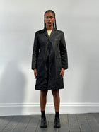 Prada 2000s nylon trench coat in XS/S, lightweight black trench with classic design and adjustable waist details.