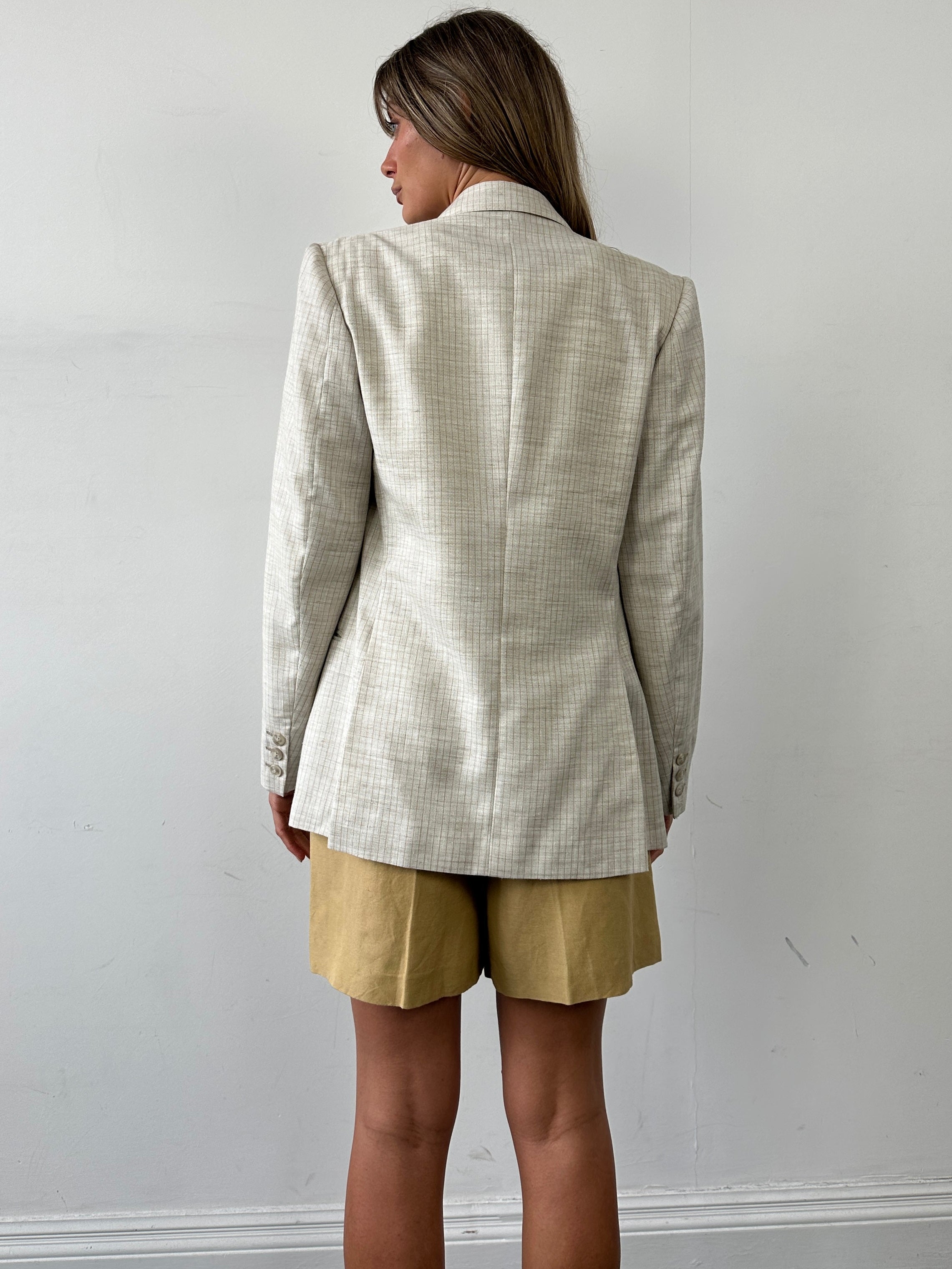 Vintage linen pinstripe double-breasted blazer in size small, featuring classic tailored design and stylish lapels.