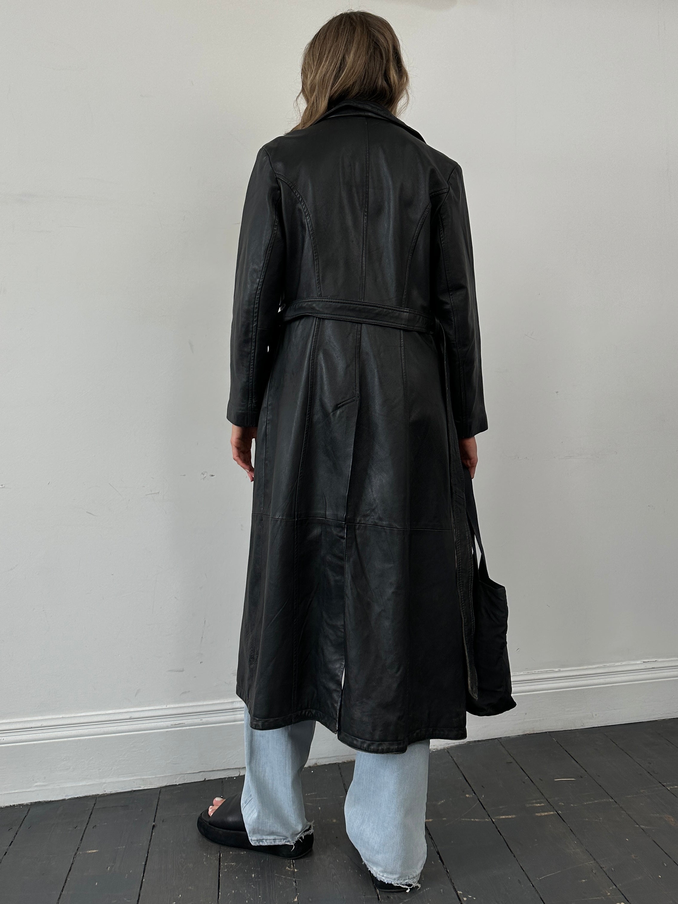 Vintage floor length leather belted trench coat jacket in size small, featuring classic design and durable leather material.
