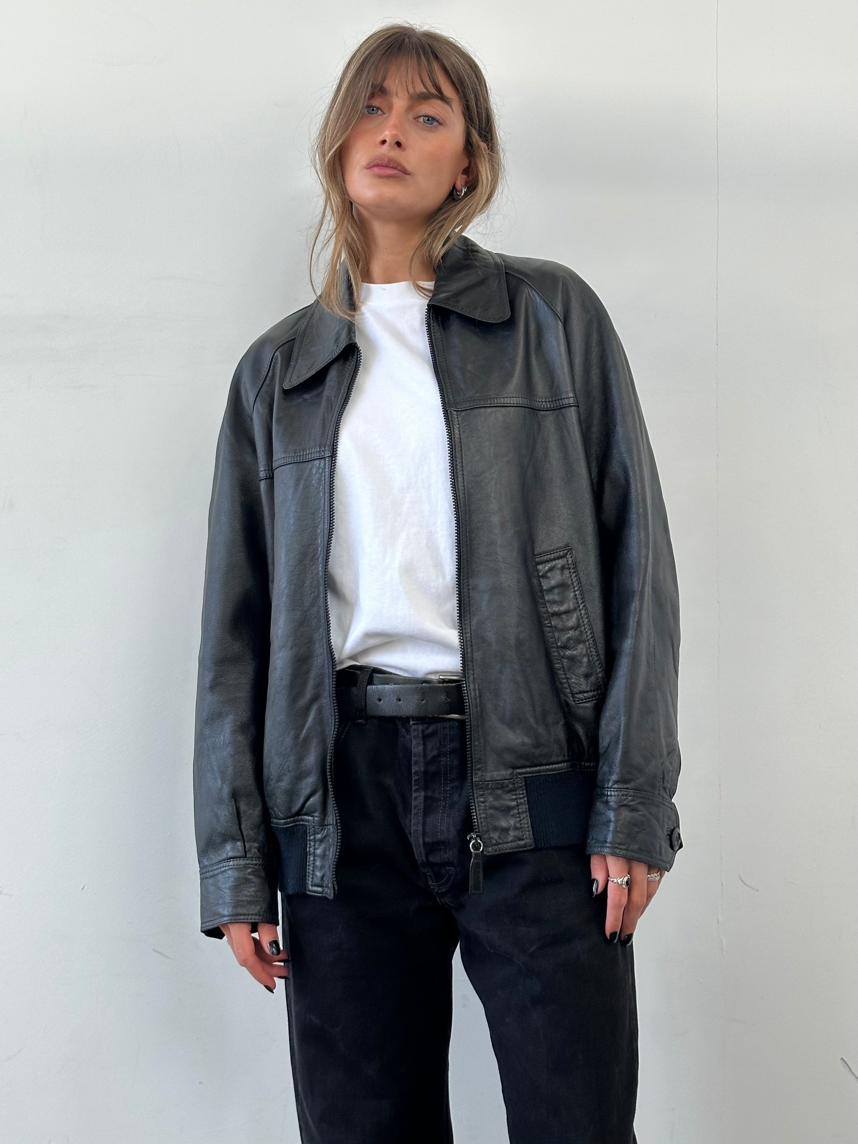 Vintage Dagger Collar Leather Bomber Jacket, size large, featuring a classic vintage design with a dagger collar and leather construction.
