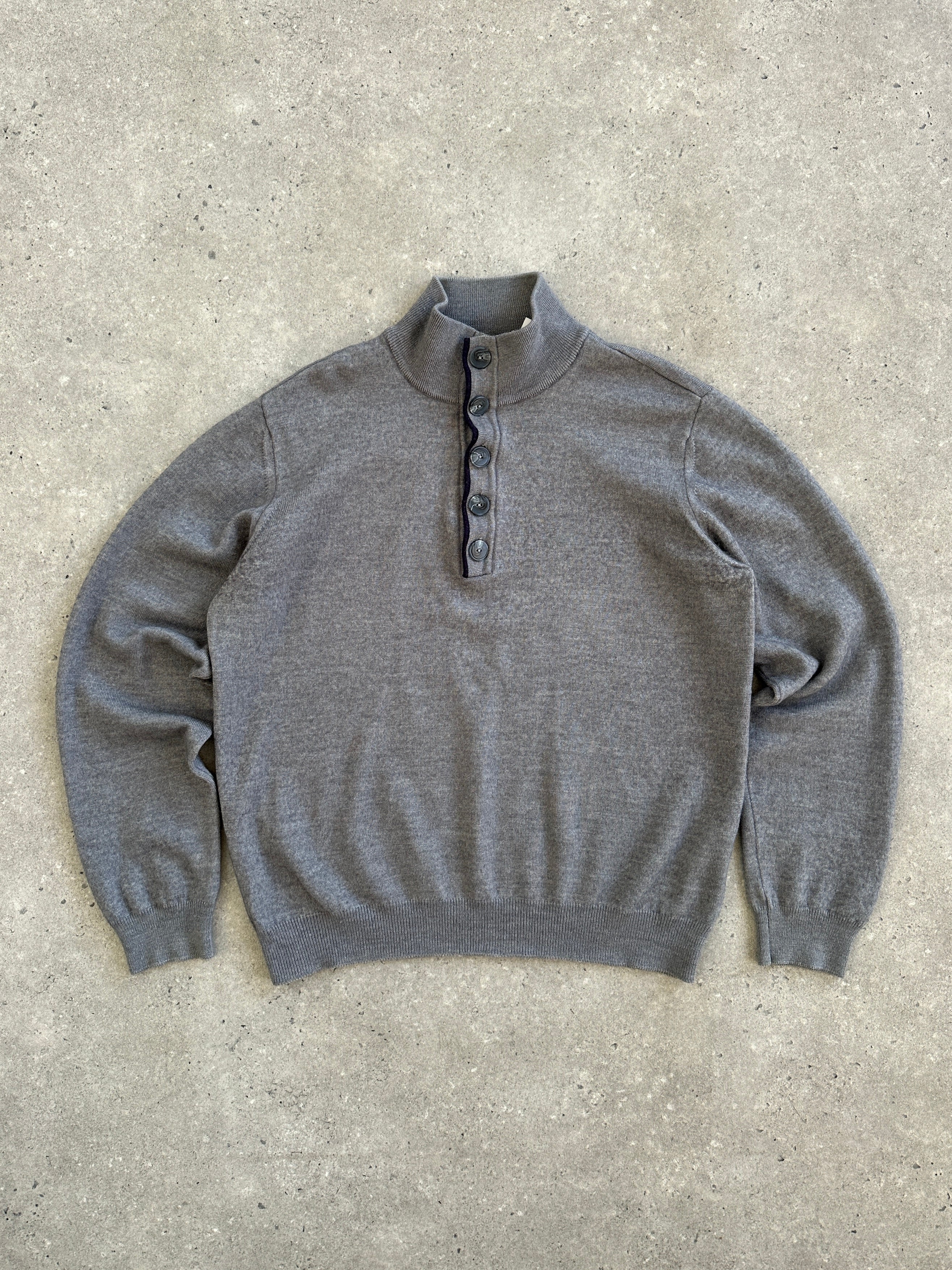 Armani Jeans 1990s wool knitted jumper with button neck in size S/M, featuring a classic 1990s style and cozy wool material.