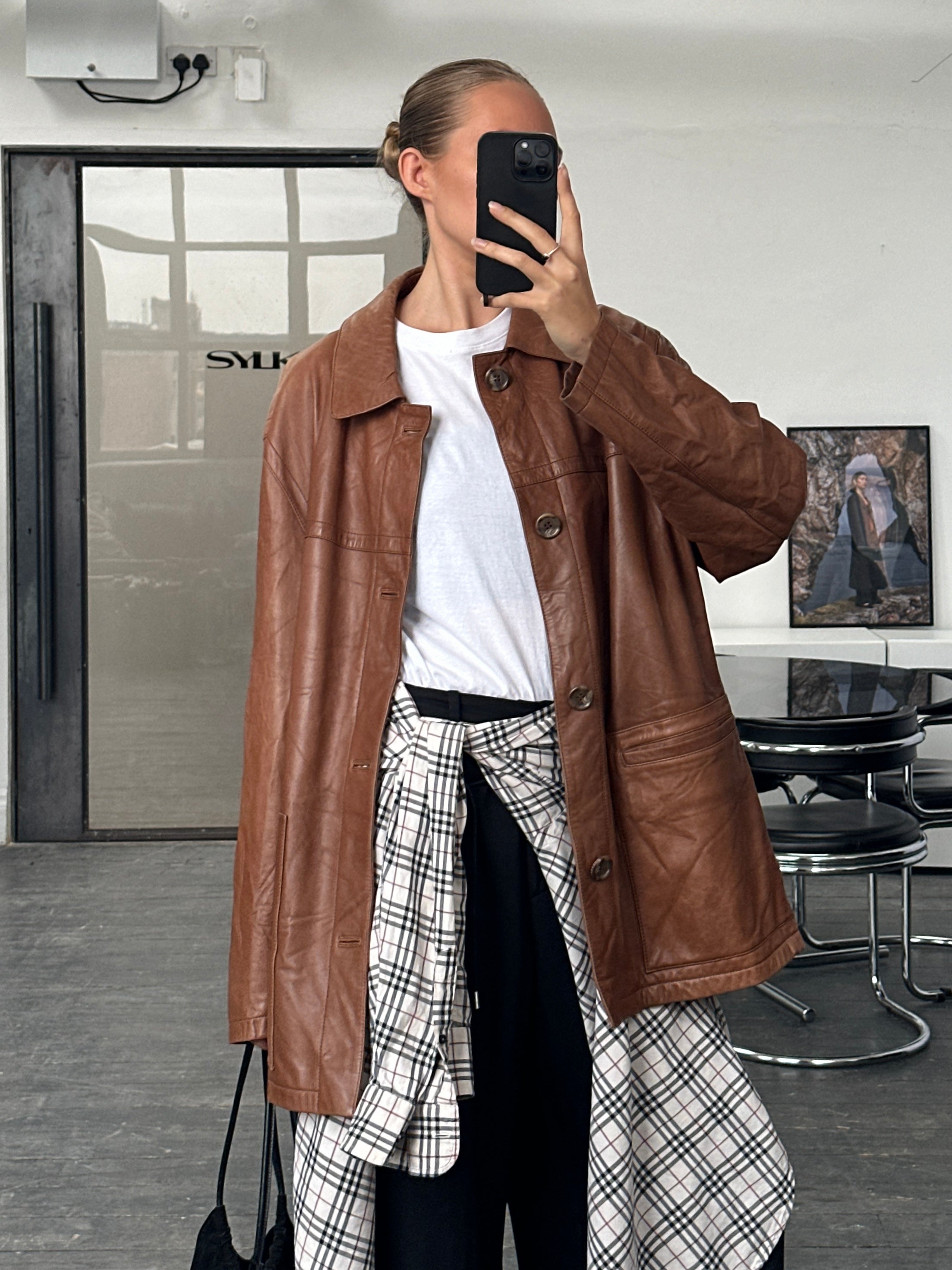 Burberry London 2000s aged smooth leather jacket in XL size, displayed on a hanger with detailed craftsmanship visible.