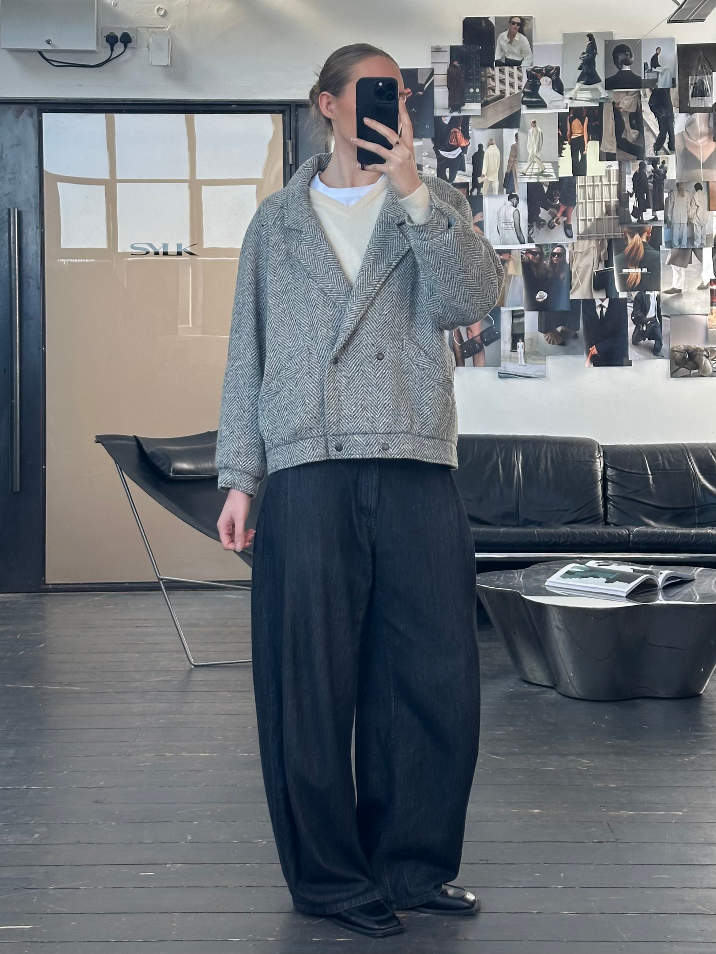 Vintage British 1980s wool herringbone bomber jacket in size M/L, classic tailored design with a vintage-inspired look.