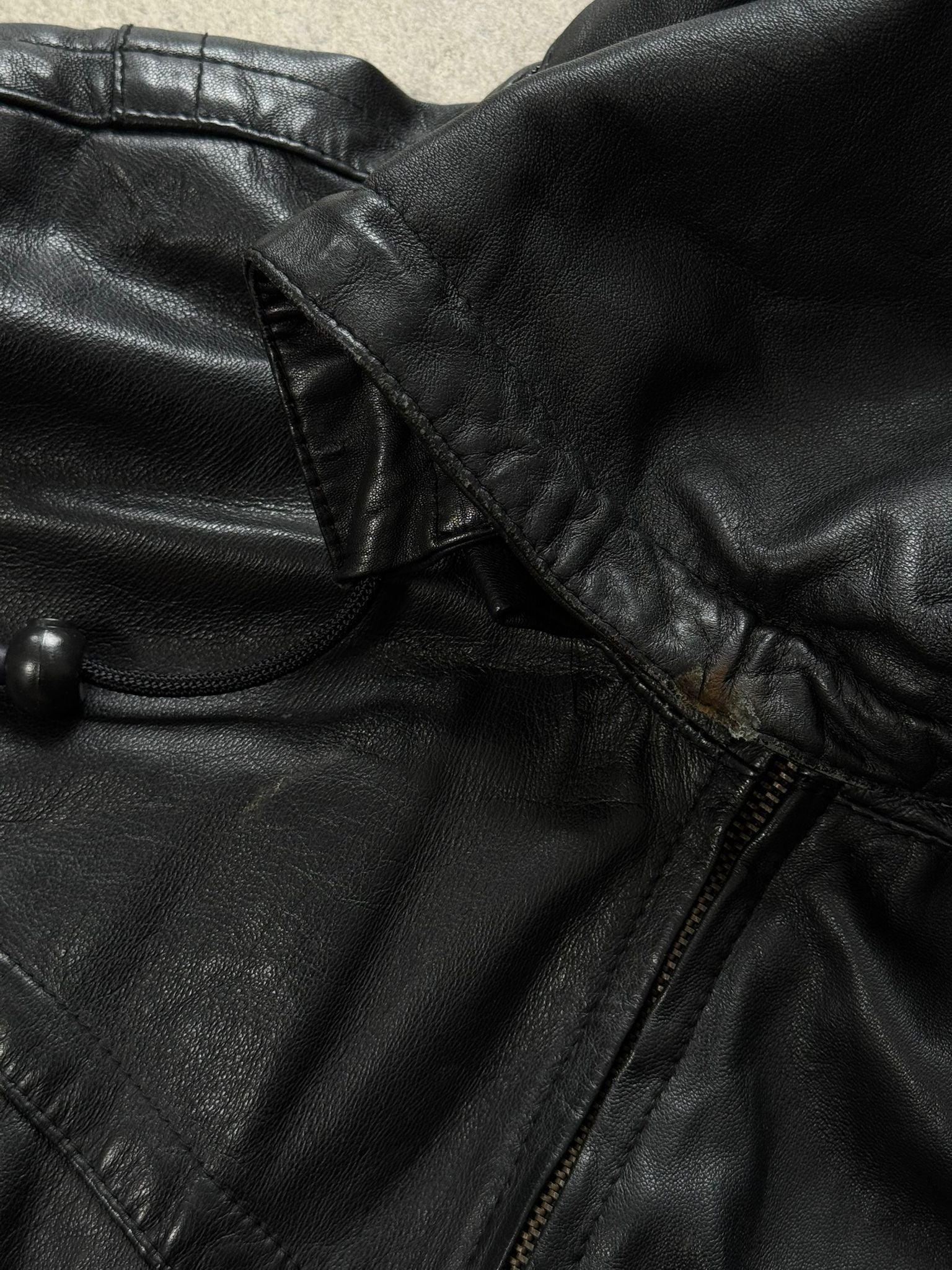 Vintage 1990s leather funnel neck hooded bomber jacket, size small, with classic style and textured leather finish.