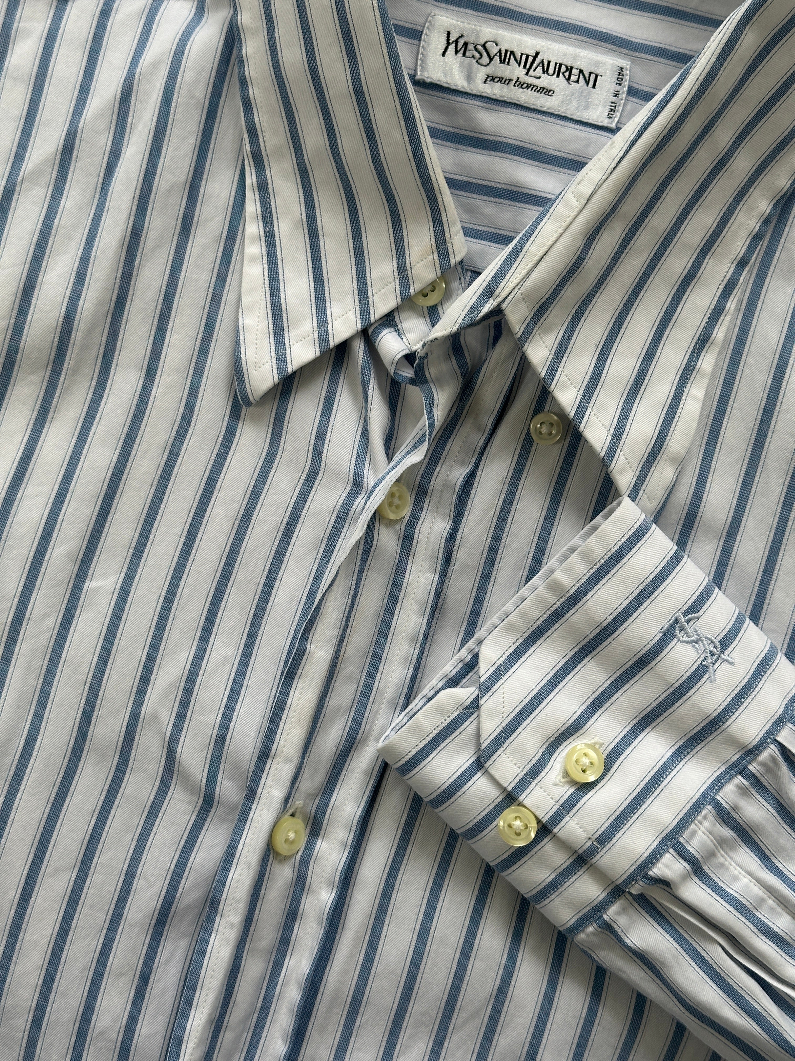 Yves Saint Laurent Pour Homme stripe logo shirt in size L/XL, featuring classic design with bold stripes and the YSL logo.