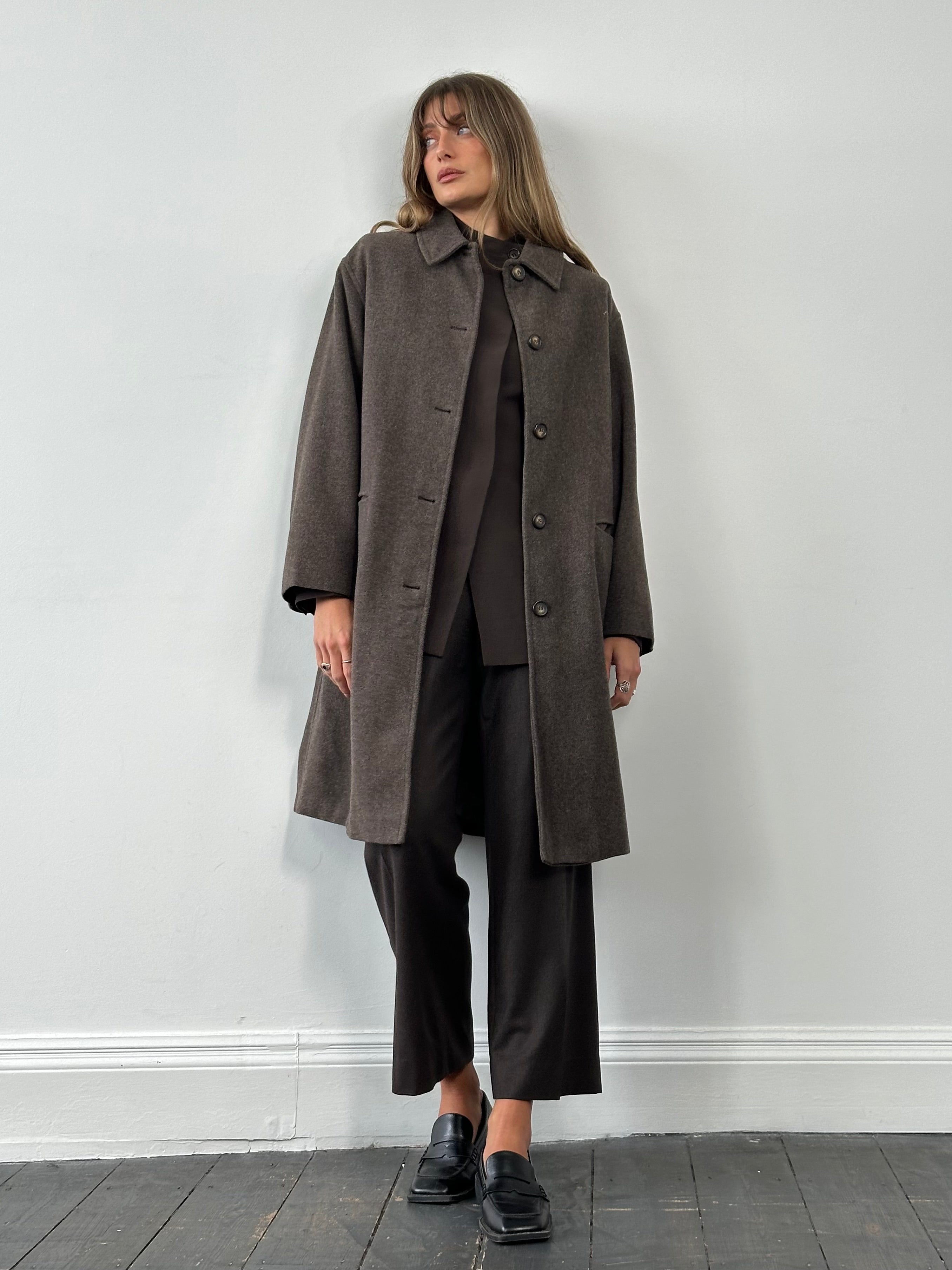 Armani Jeans pure virgin wool single-breasted coat in size L, shown in dark gray with classic lapel design and button closure.