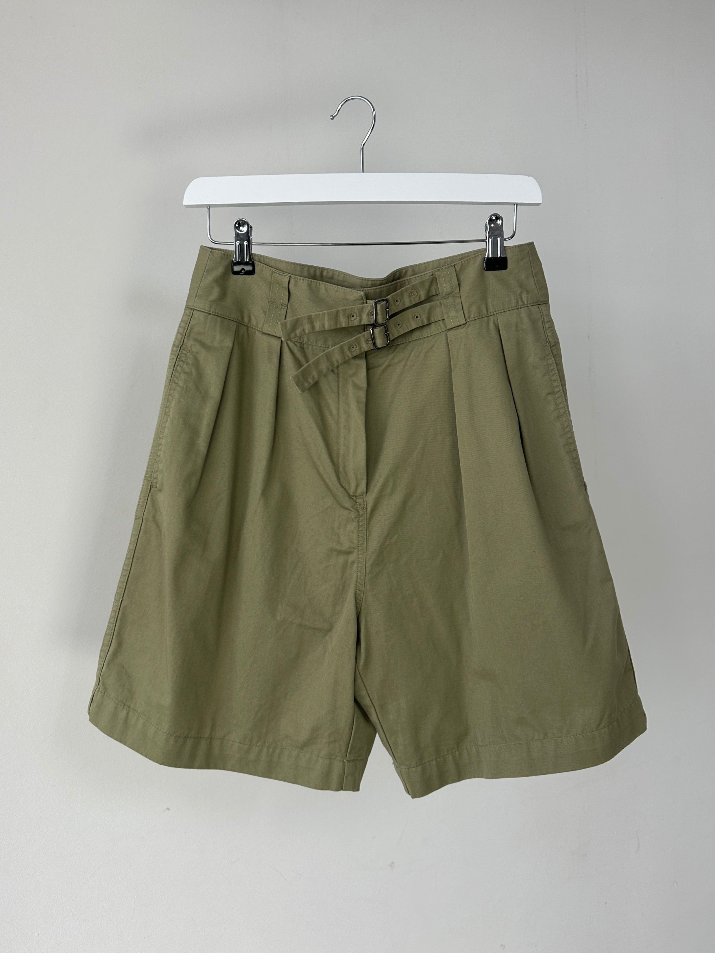 Lacoste high waisted pure cotton shorts in size W28, featuring a classic design and Lacoste logo on the waistband.