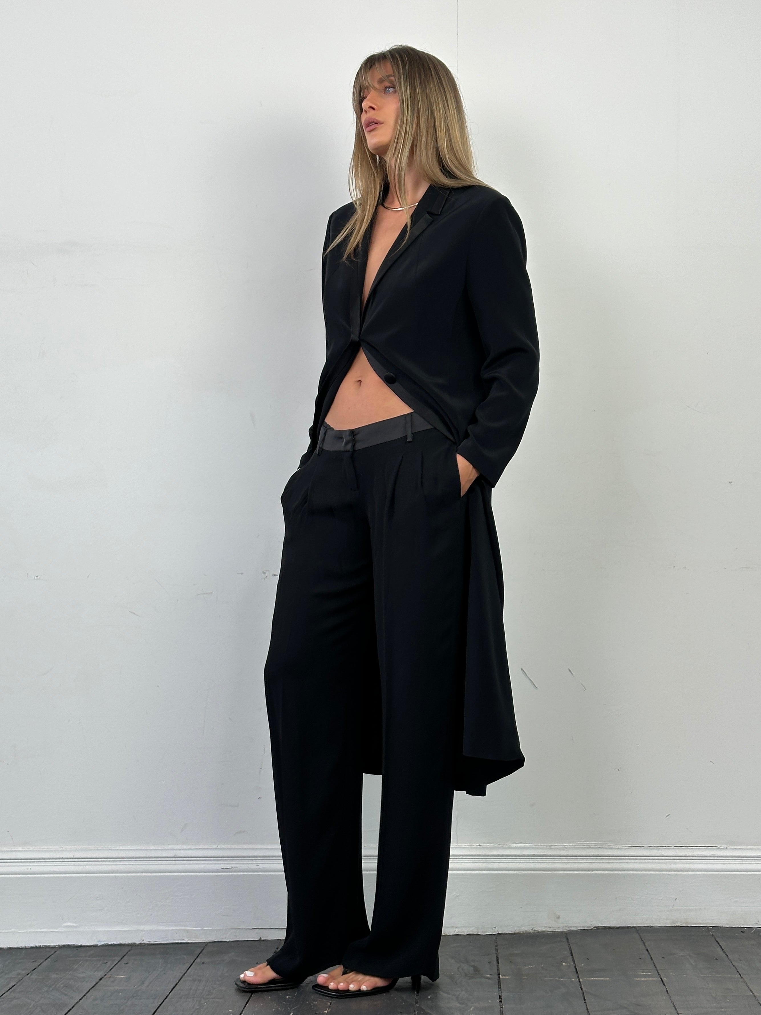 Vintage lightweight tuxedo coat for men, size small, featuring classic tailored design and sleek fabric in a vintage style.