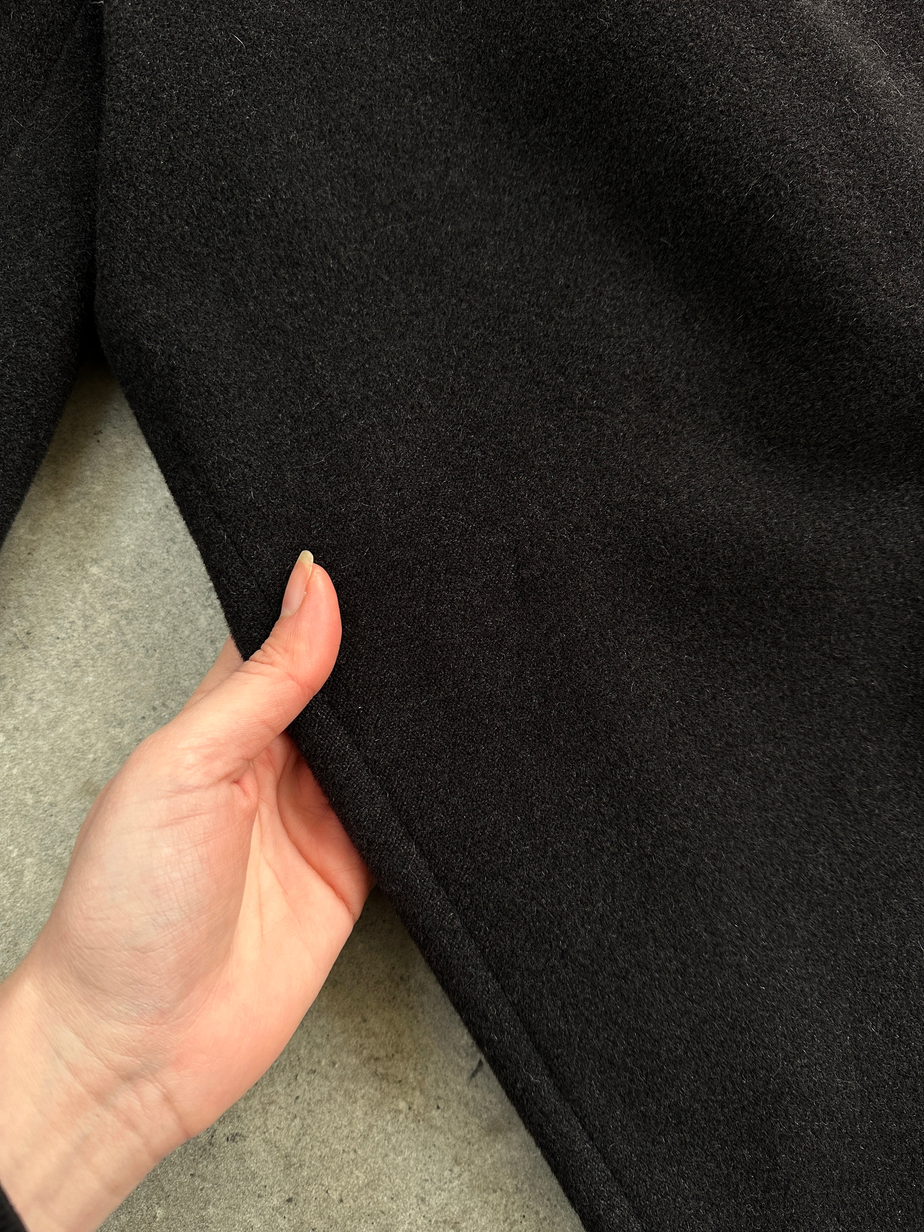 Max Mara pure wool double-breasted coat in size M, shown on a hanger with classic lapels and tailored fit.