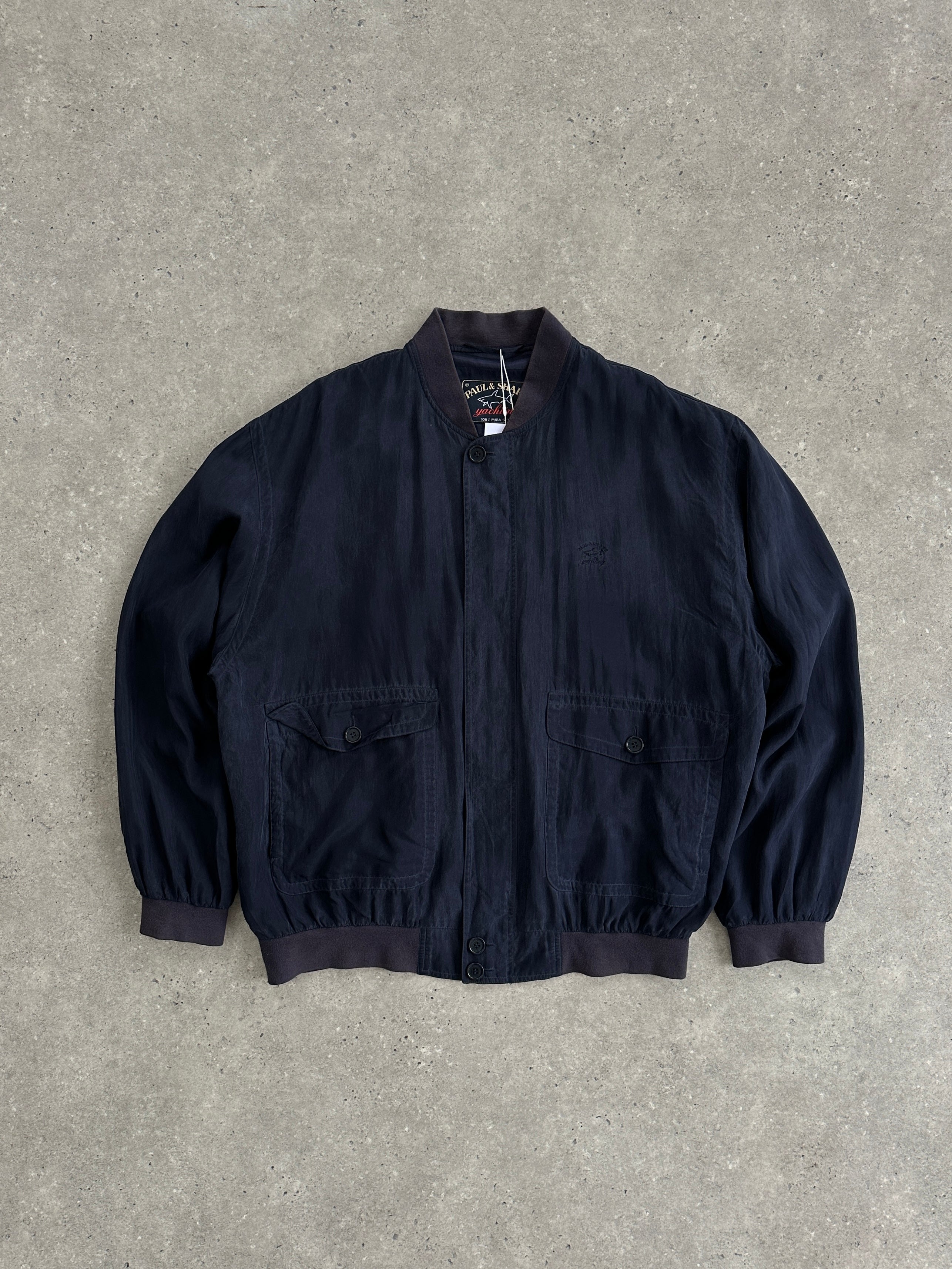 Paul & Shark pure silk bomber jacket in XXL, featuring a smooth silk fabric and classic bomber style with a zip front and ribbed cuffs.