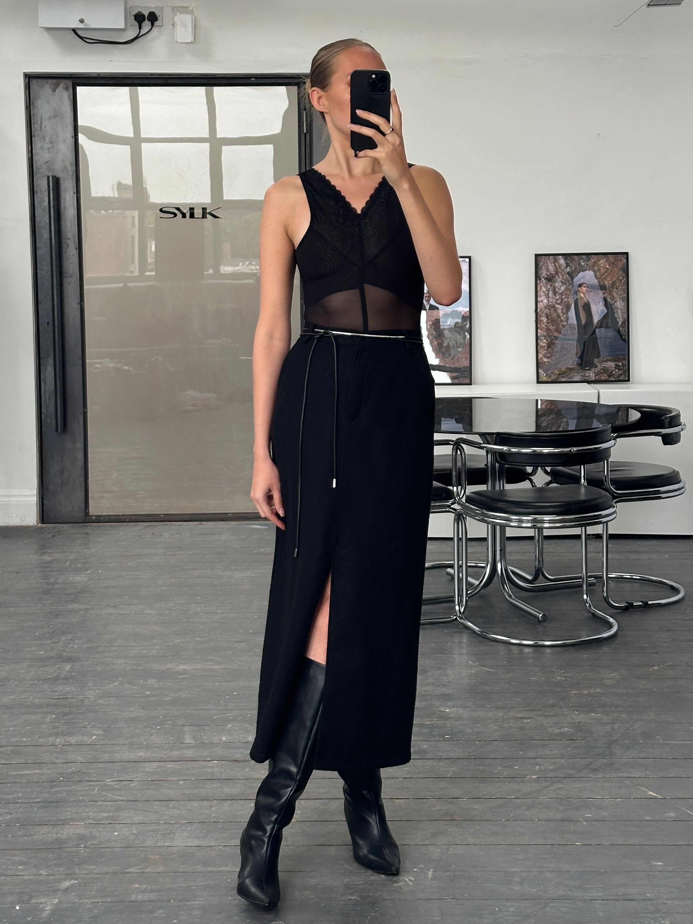Vintage 2000s sheer lace bodysuit, XS/S, showcasing delicate lace details and fitted top style in a classic vintage design.