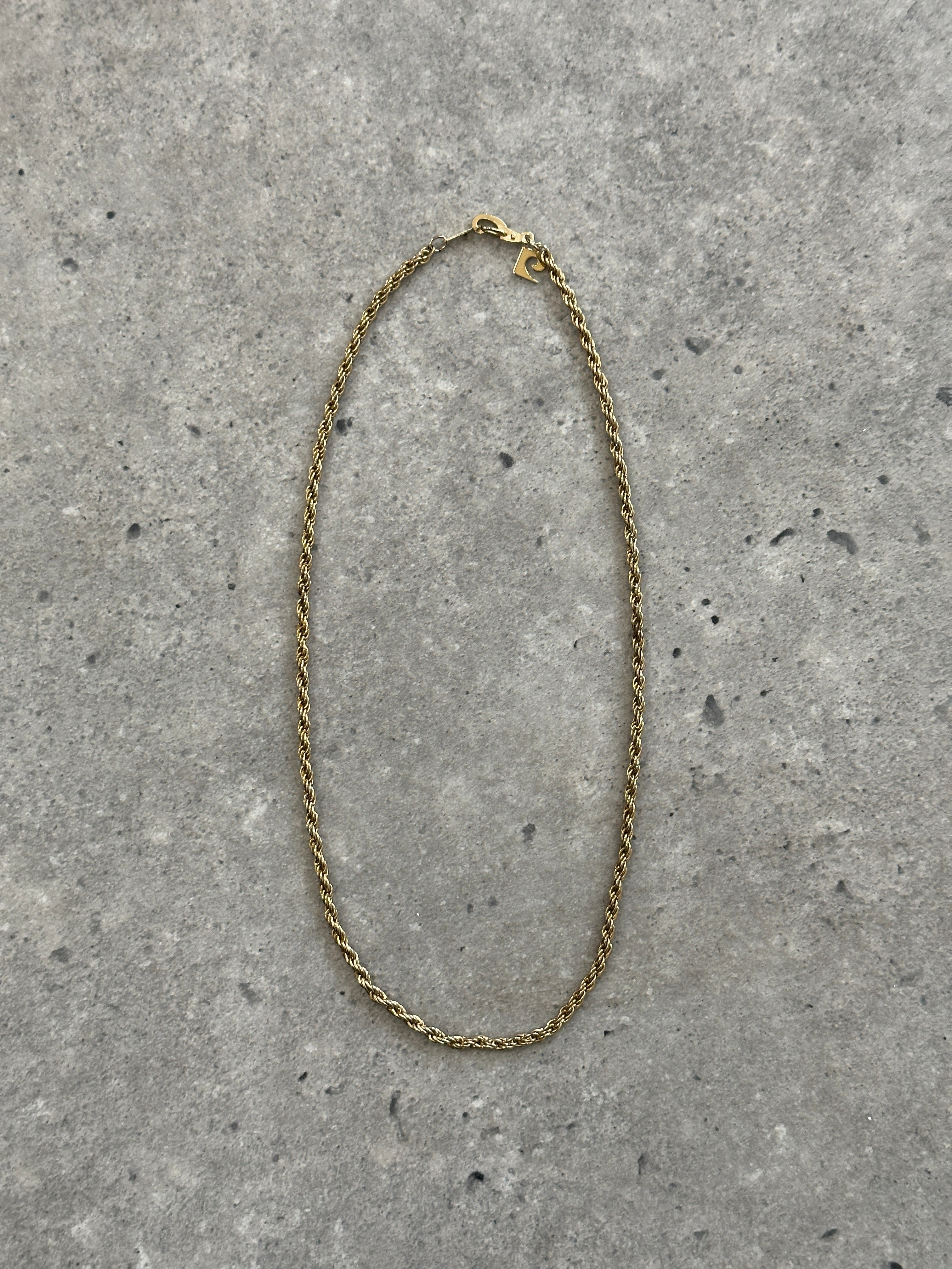 Pierre Cardin gold plated necklace with a sleek chain design, showcasing elegant jewelry craftsmanship.