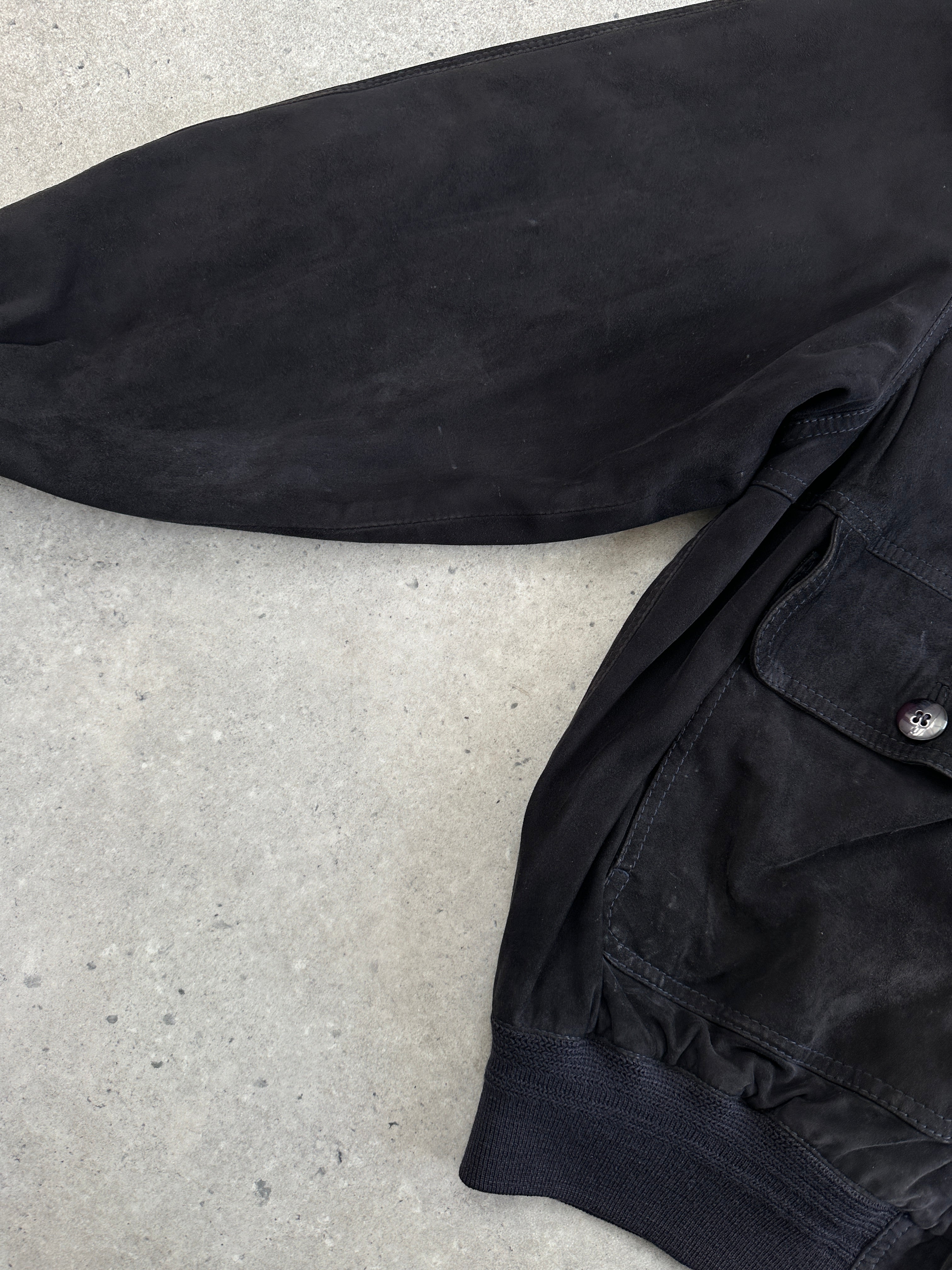 Vintage 1980s high neck suede bomber jacket in XL, featuring a classic leather jacket style with a smooth suede finish.