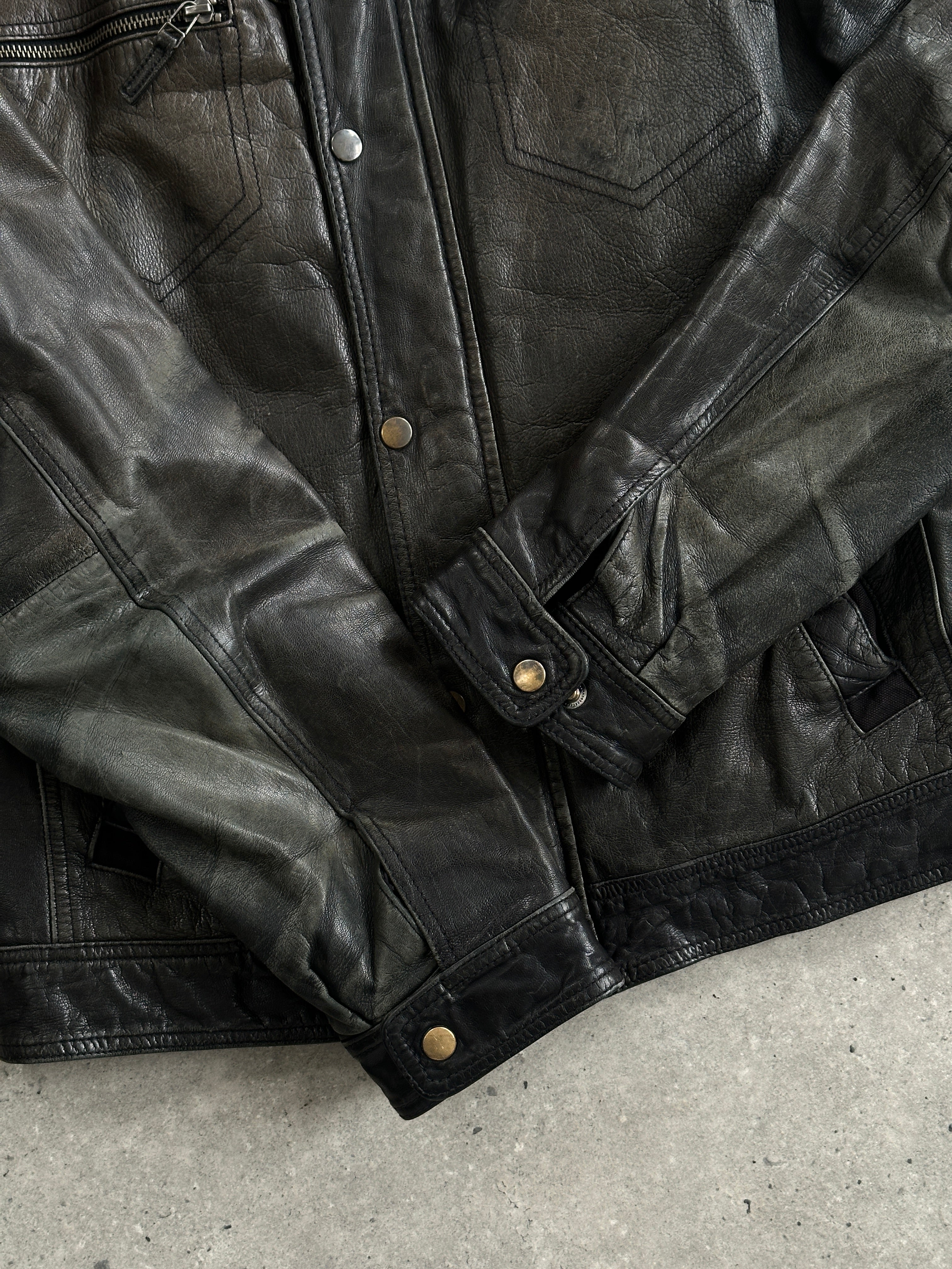 Conbipel distressed leather jacket for men, size M, featuring a rugged, worn-in look and classic jacket style.