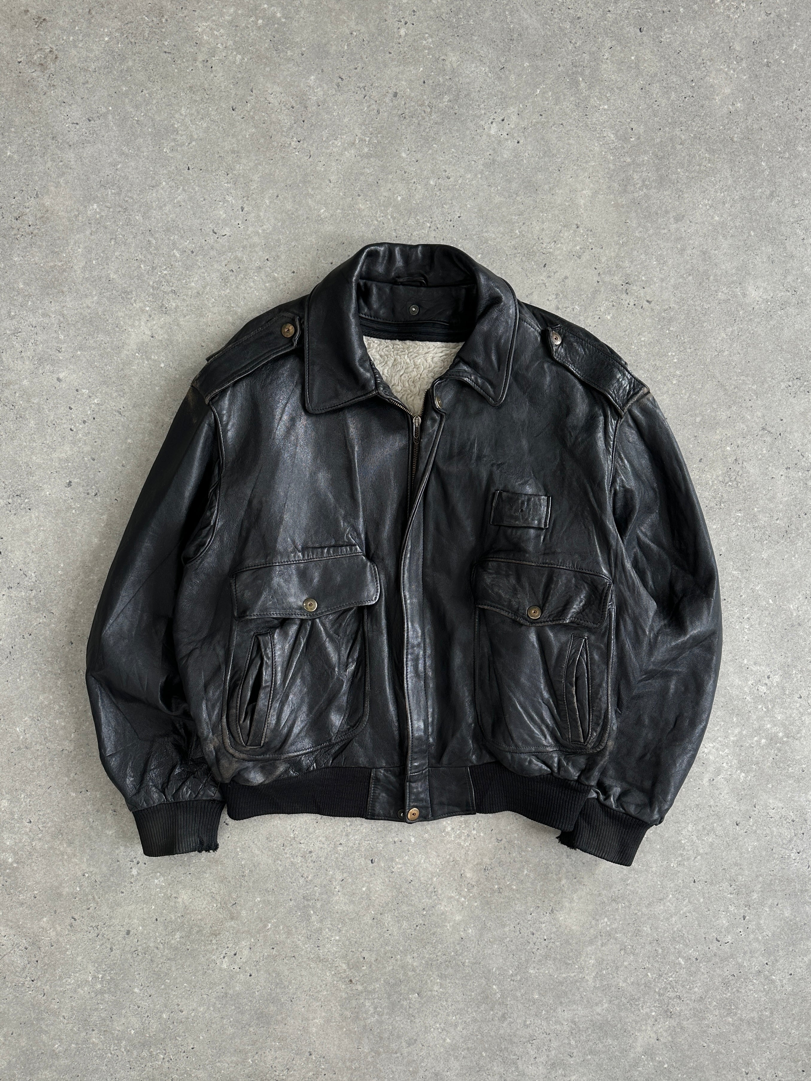 Vintage Italian leather bomber jacket with removable fleece lining, size large, stylish and warm outerwear for men.