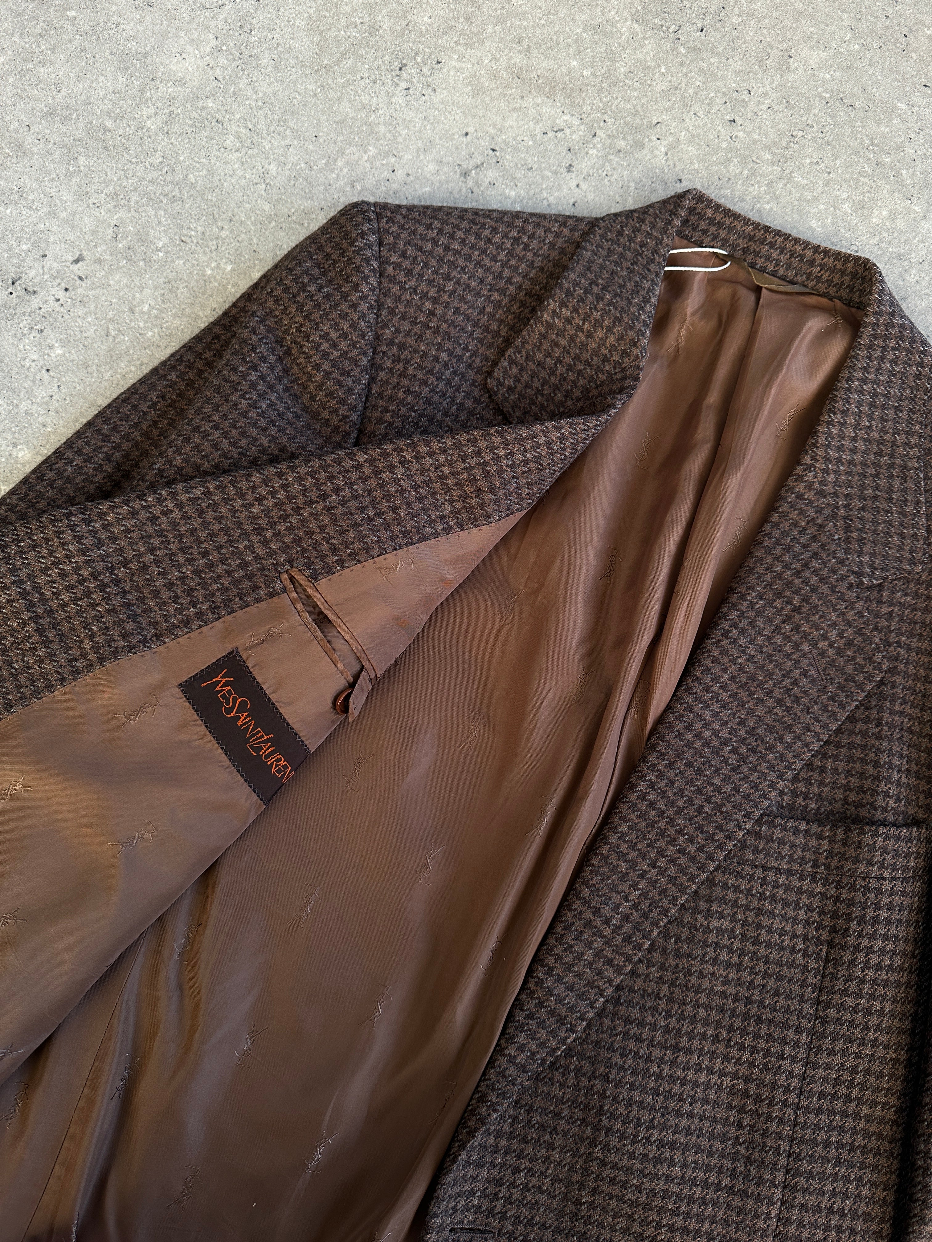 Yves Saint Laurent vintage 80s wool tweed single-breasted blazer in size L, featuring classic tailored fit and textured fabric.