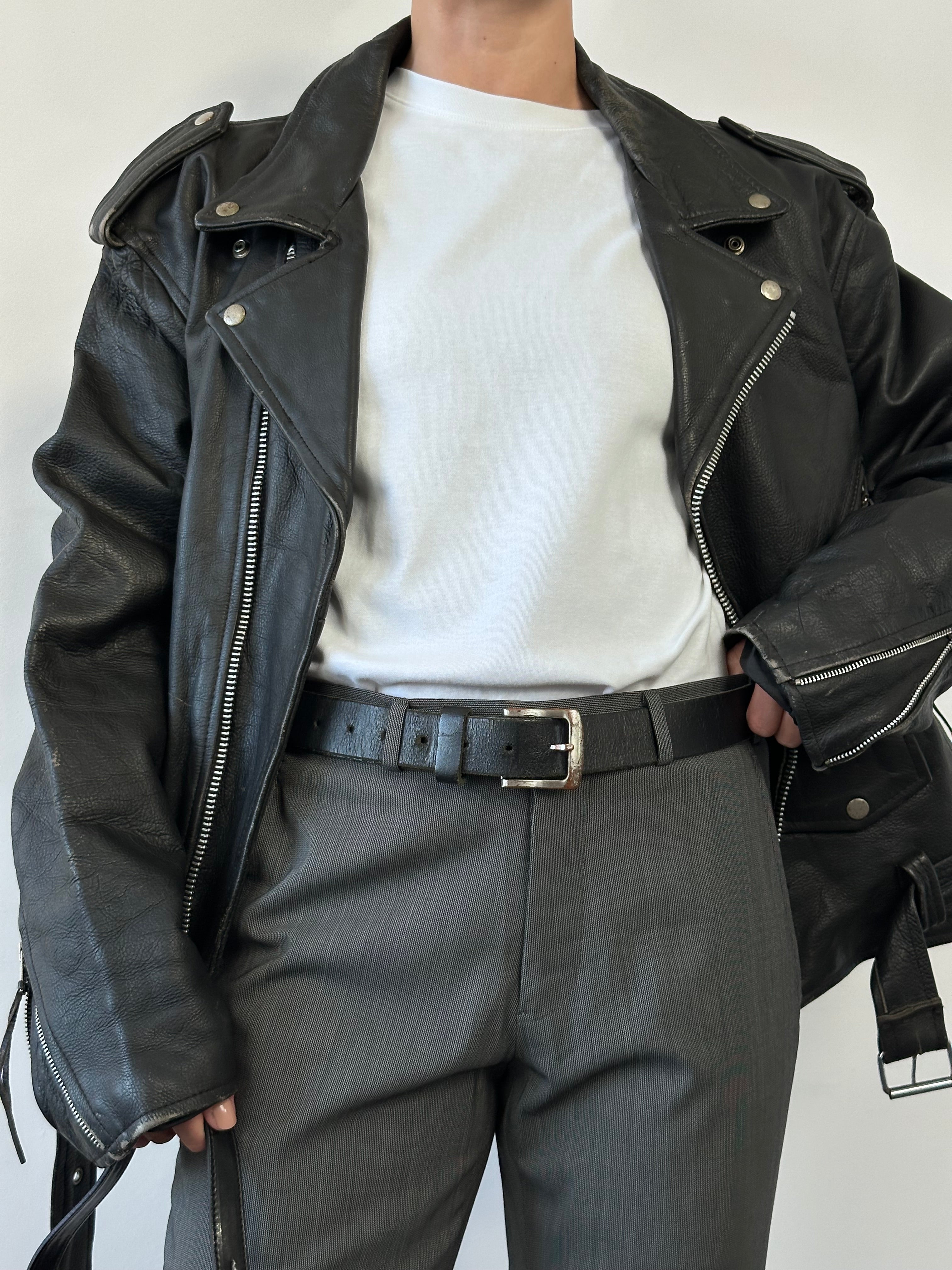 Vintage brand chrome leather belt, size W34-38, featuring a classic buckle and sleek vintage design.