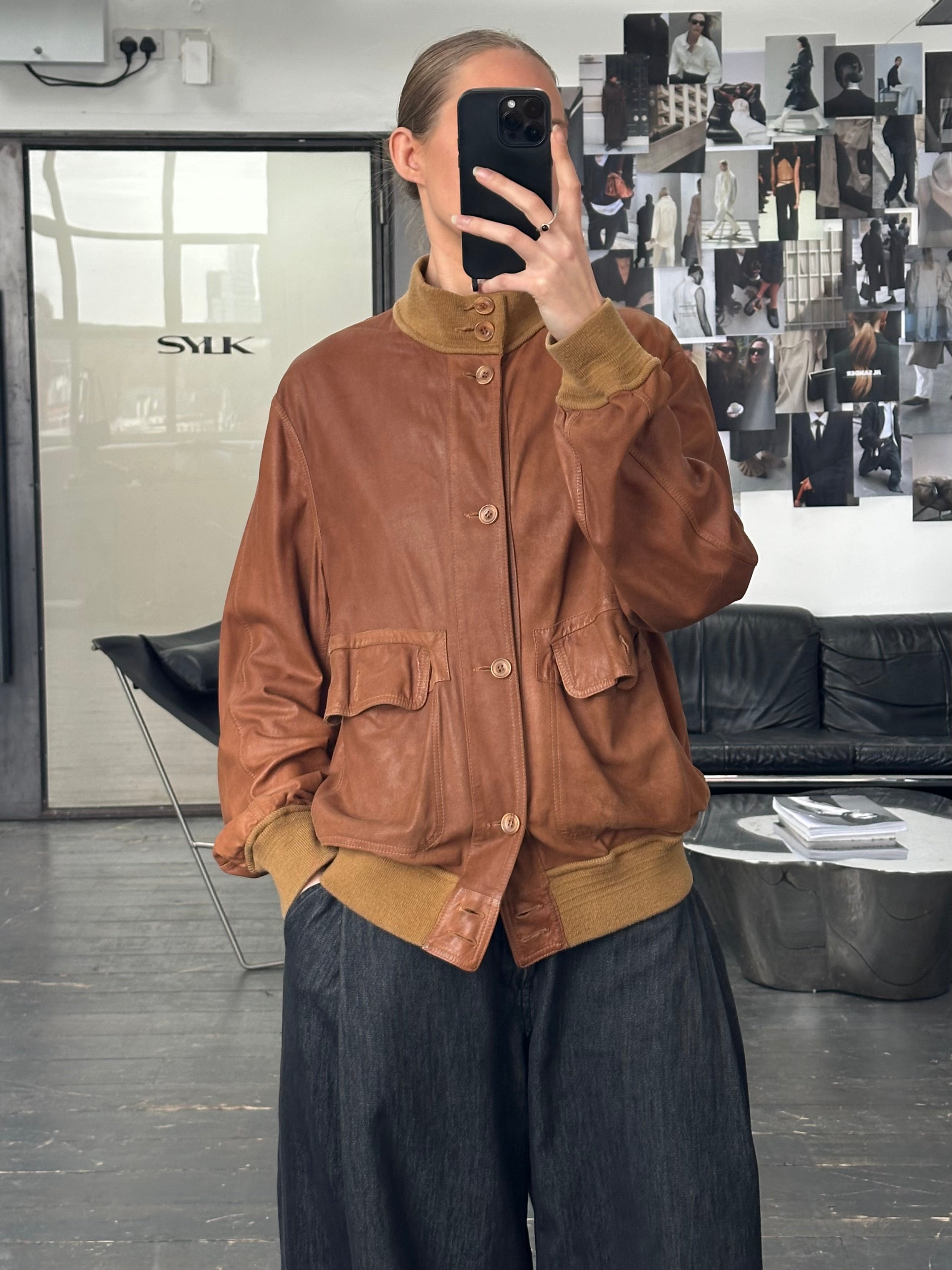 Vintage Italian 1980s reversible suede leather jacket, size large, with classic design and soft textured suede exterior.