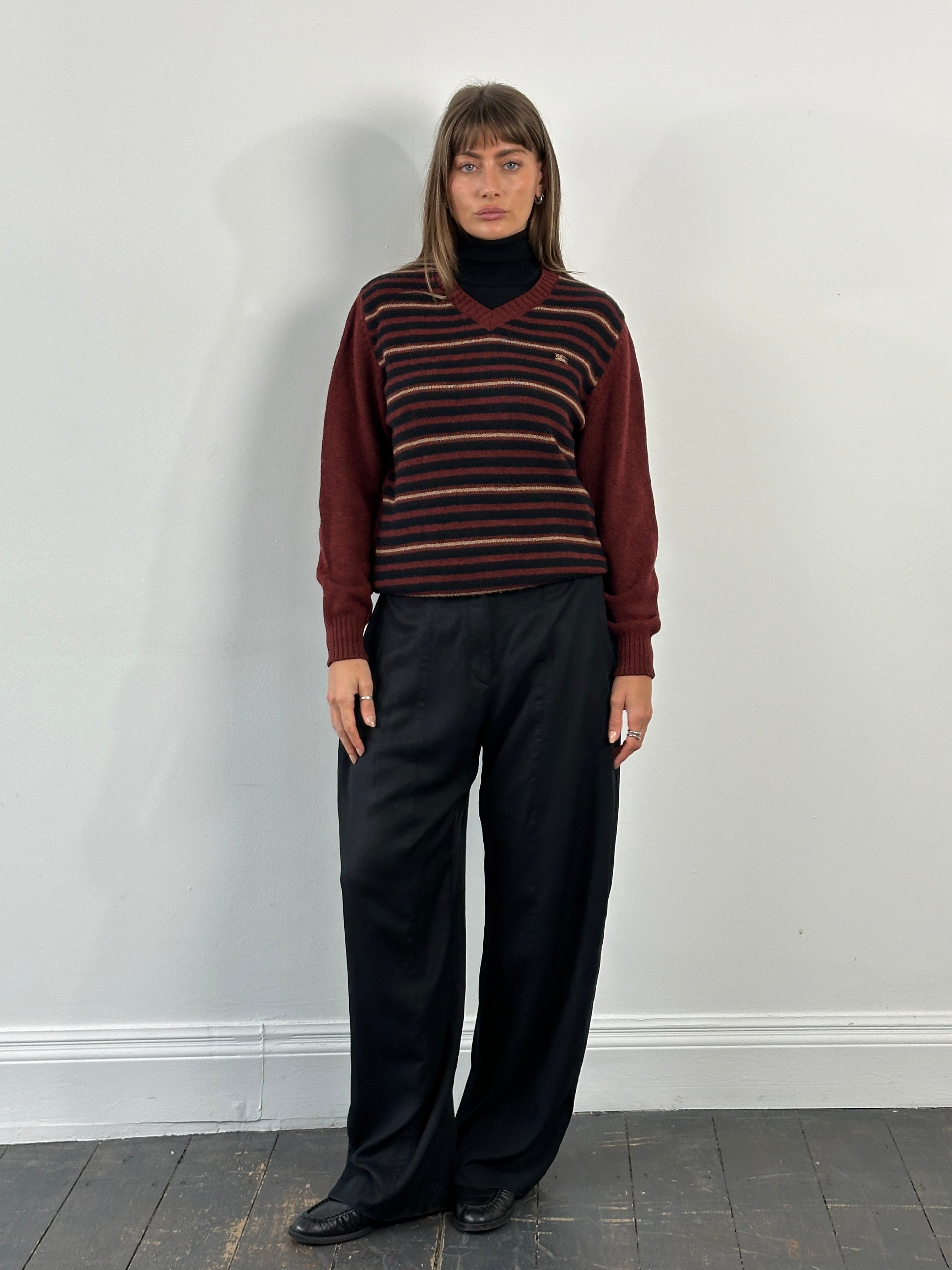 Burberry London 2000s lambswool V-neck striped jumper, men's size M/L, featuring classic Burberry pattern and cozy knit texture.