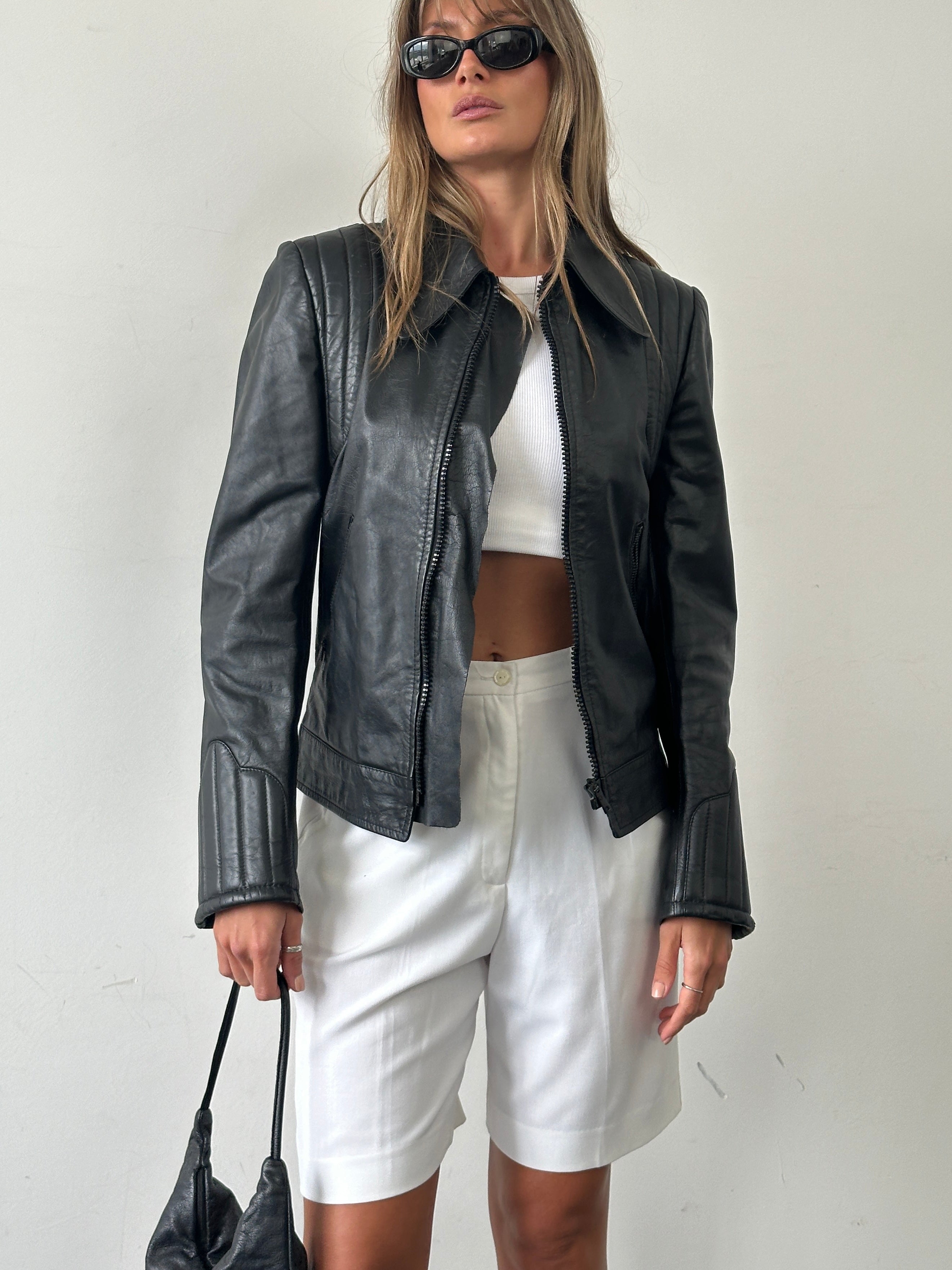 Italian vintage quilted leather jacket in XS, featuring classic design and textured leather from the Vintage brand.