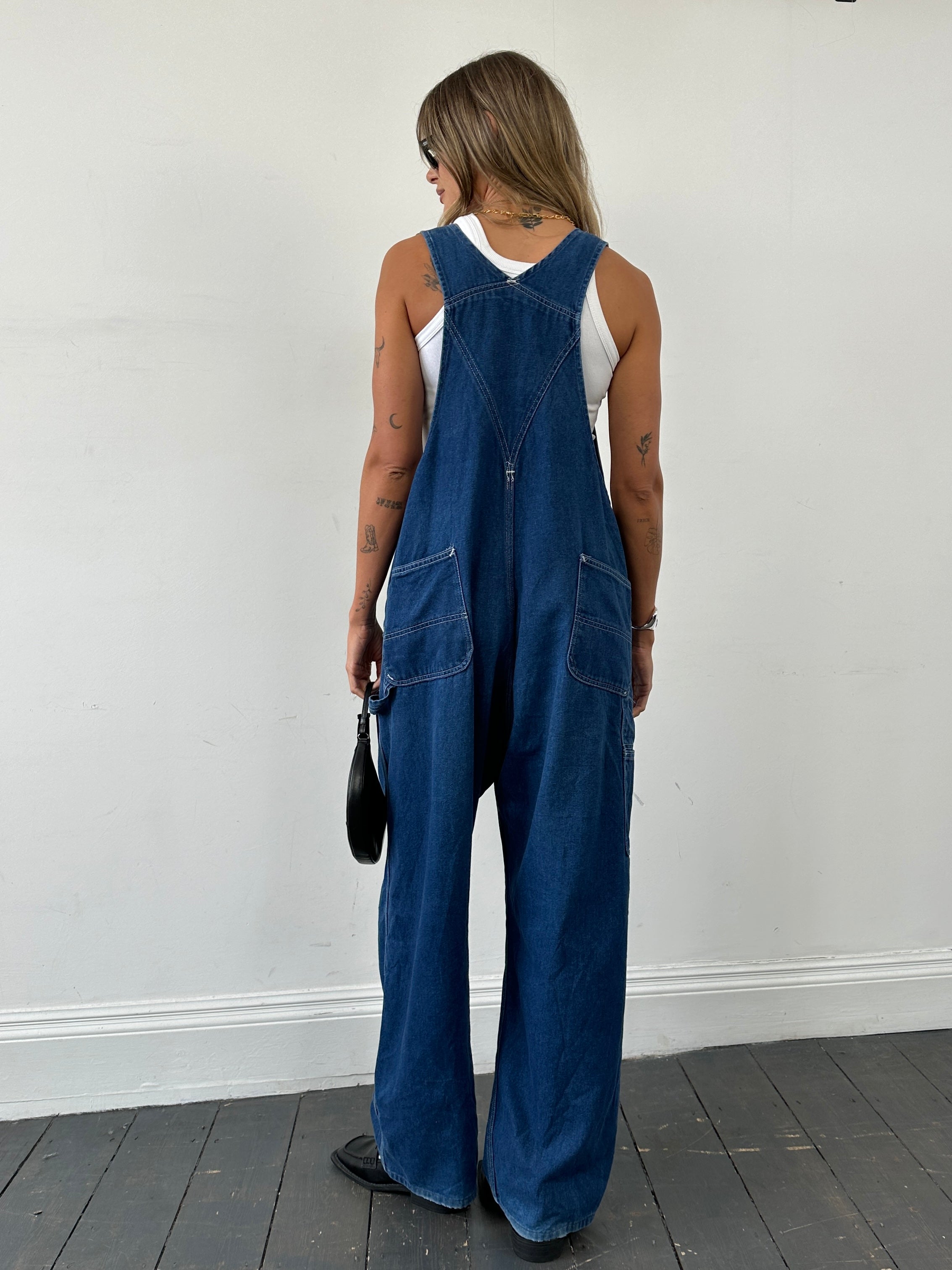 Vintage Roebucks contrast stitch mid wash denim dungarees in XL size, showing classic design and detailed stitching.