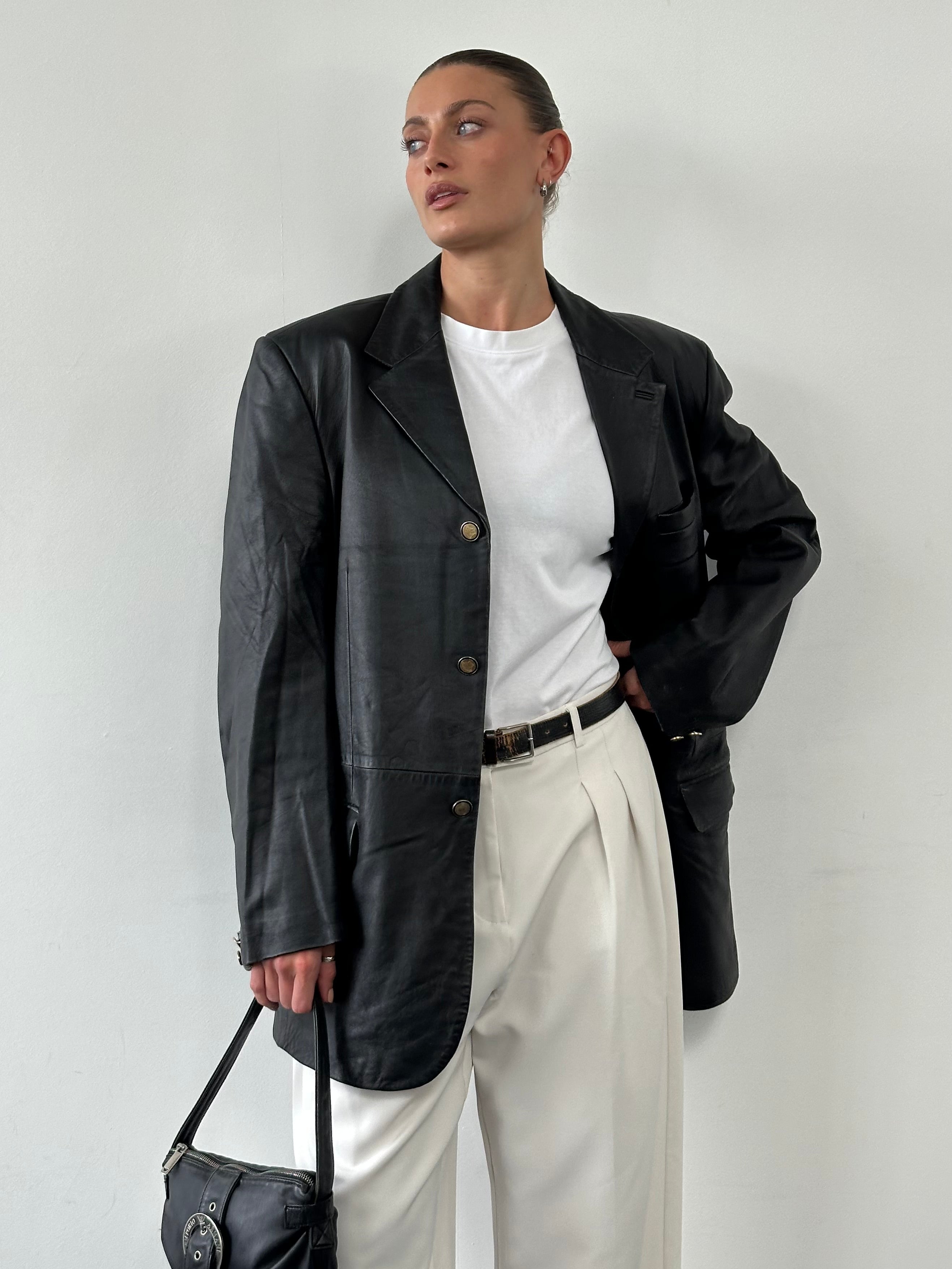 Versace Jeans Couture bespoke leather blazer jacket in XL, featuring a tailored fit and classic button details.