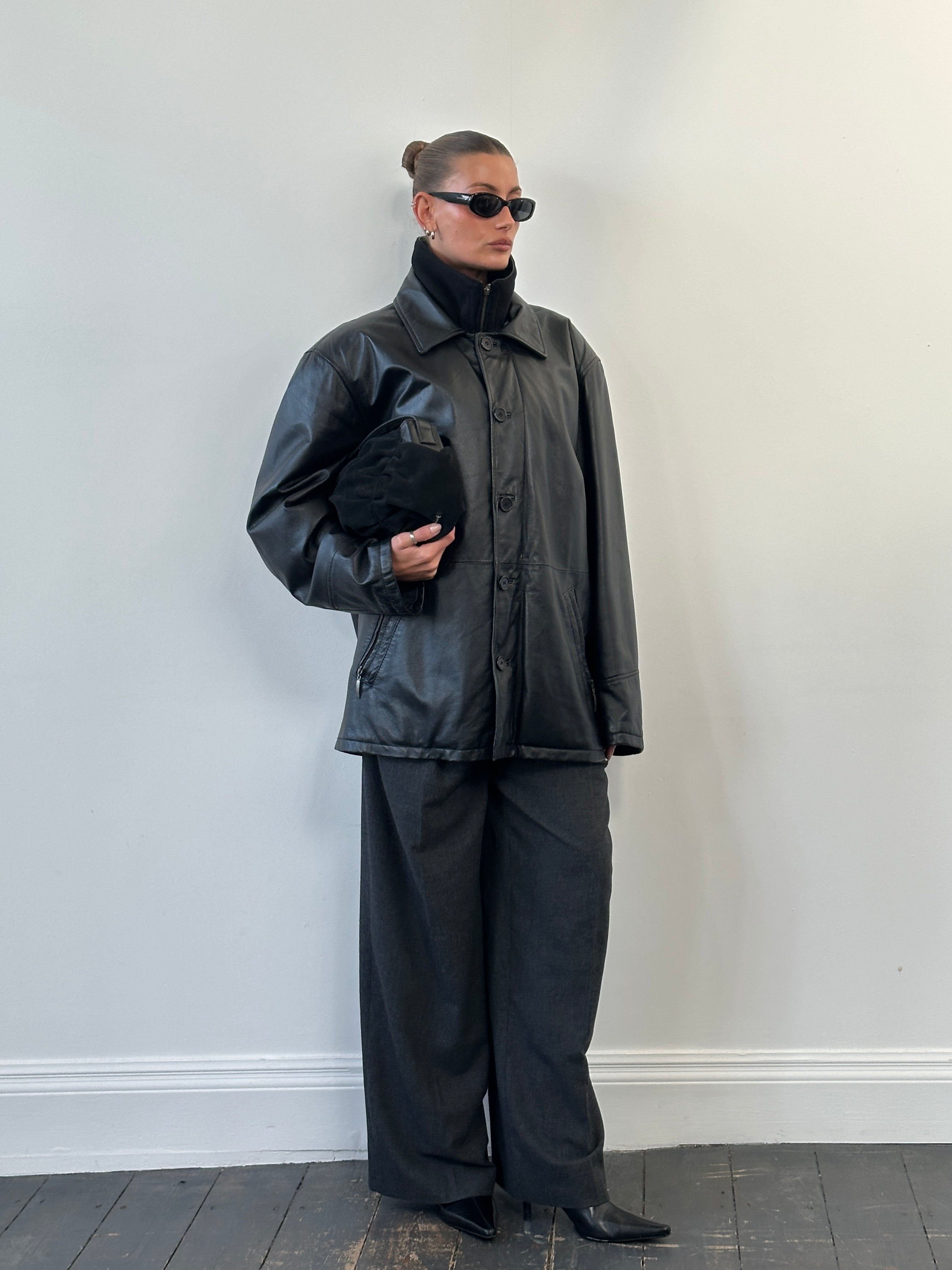 Vintage 1990s XXL leather jacket with funnel neck, classic design, in rich brown leather, showcasing retro style and craftsmanship.