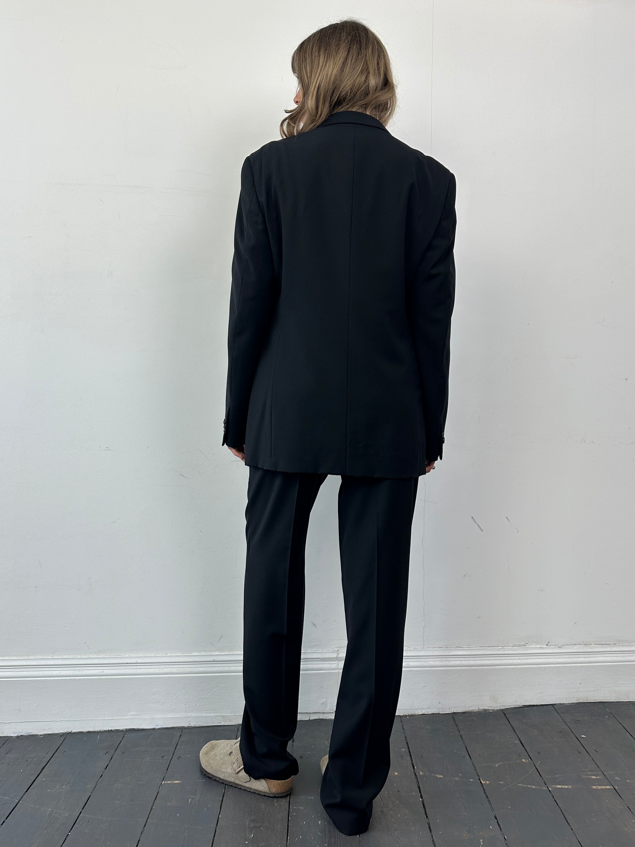 Armani Collezioni pure wool single-breasted suit jumpsuit in size 38R/W30, tailored fit with classic lapels and front pockets.