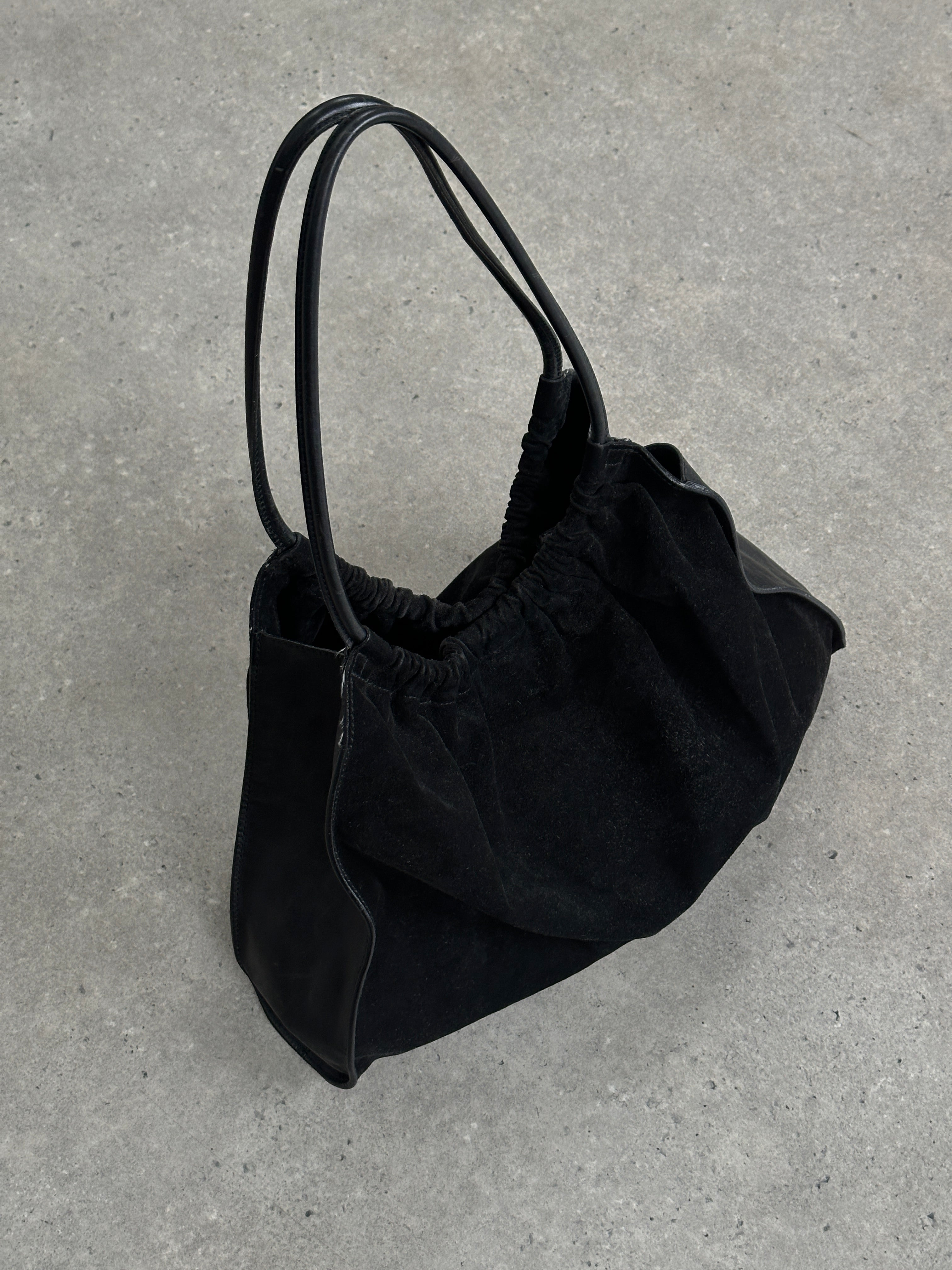 Gucci 1990s Tom Ford suede leather hobo shoulder bag with slouchy design and minimalist style.