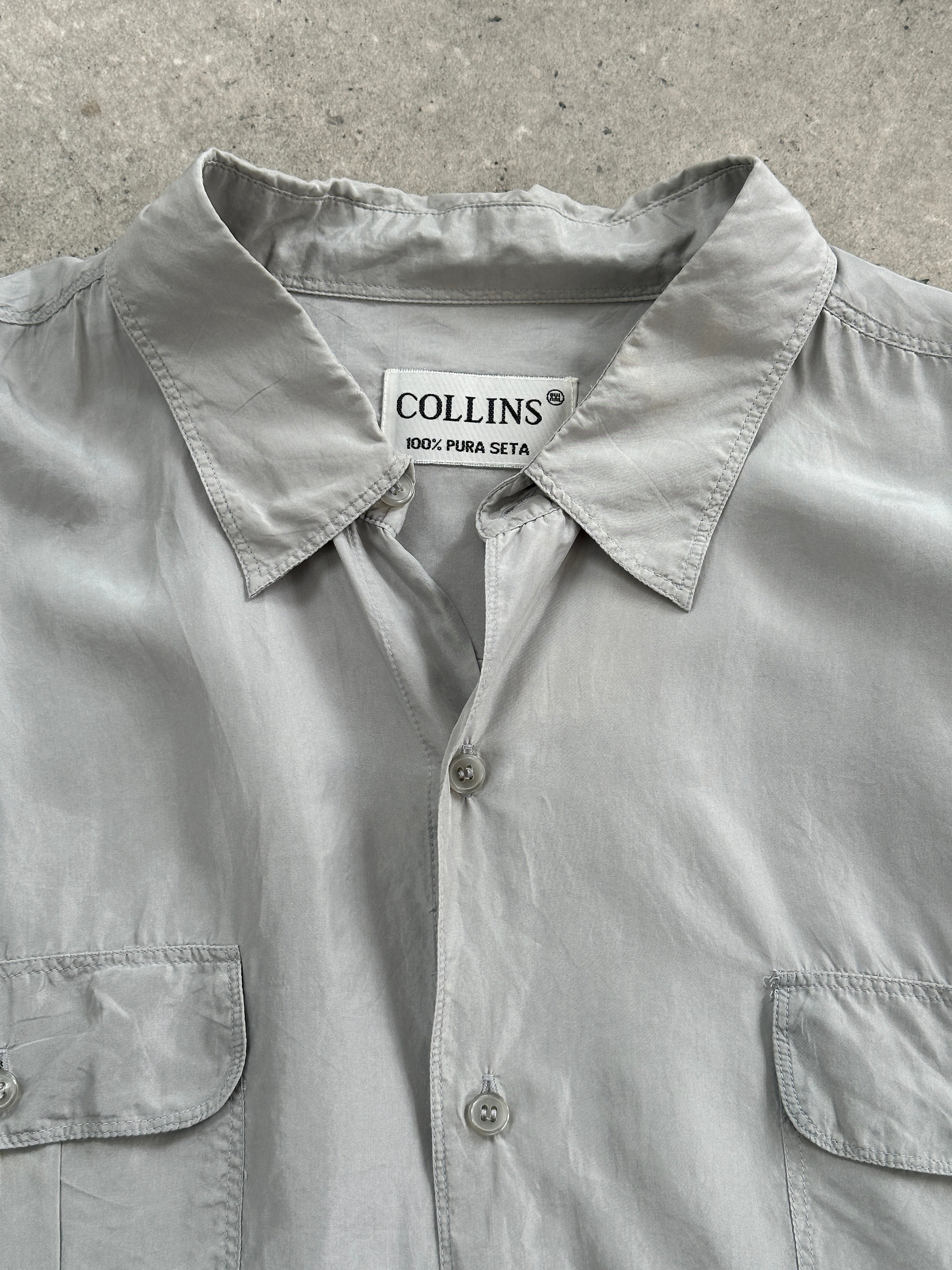 Vintage 1990s relaxed pure silk shirt in XL, featuring a soft, flowing fabric and classic design, displayed on a neutral background.