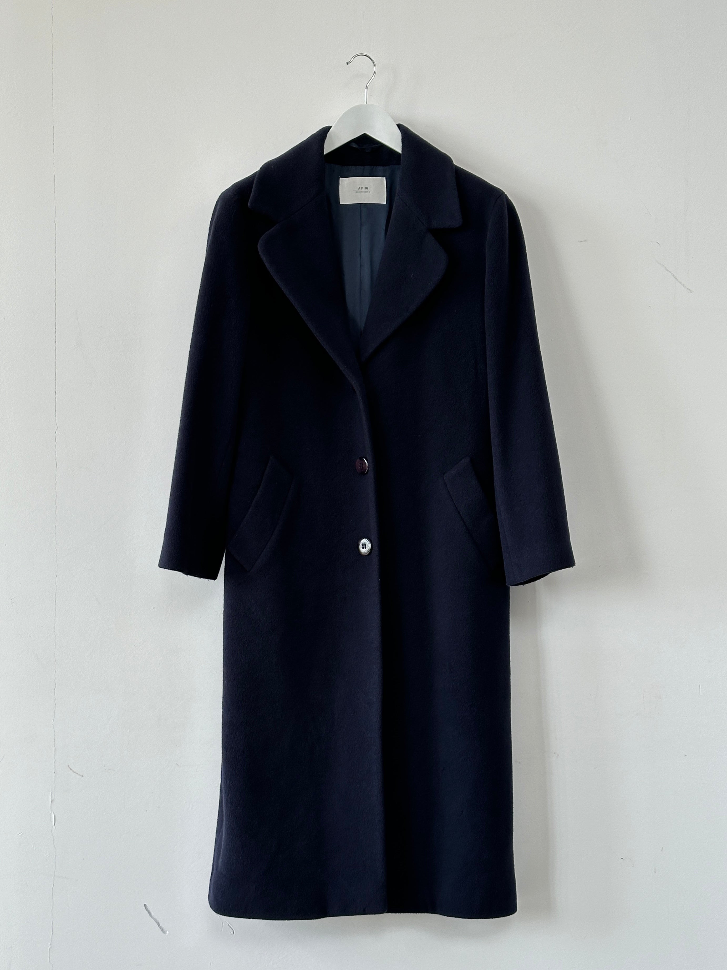 Vintage Virgin Wool Single Breasted Coat in size M, showcasing classic design and tailored fit in a neutral color.