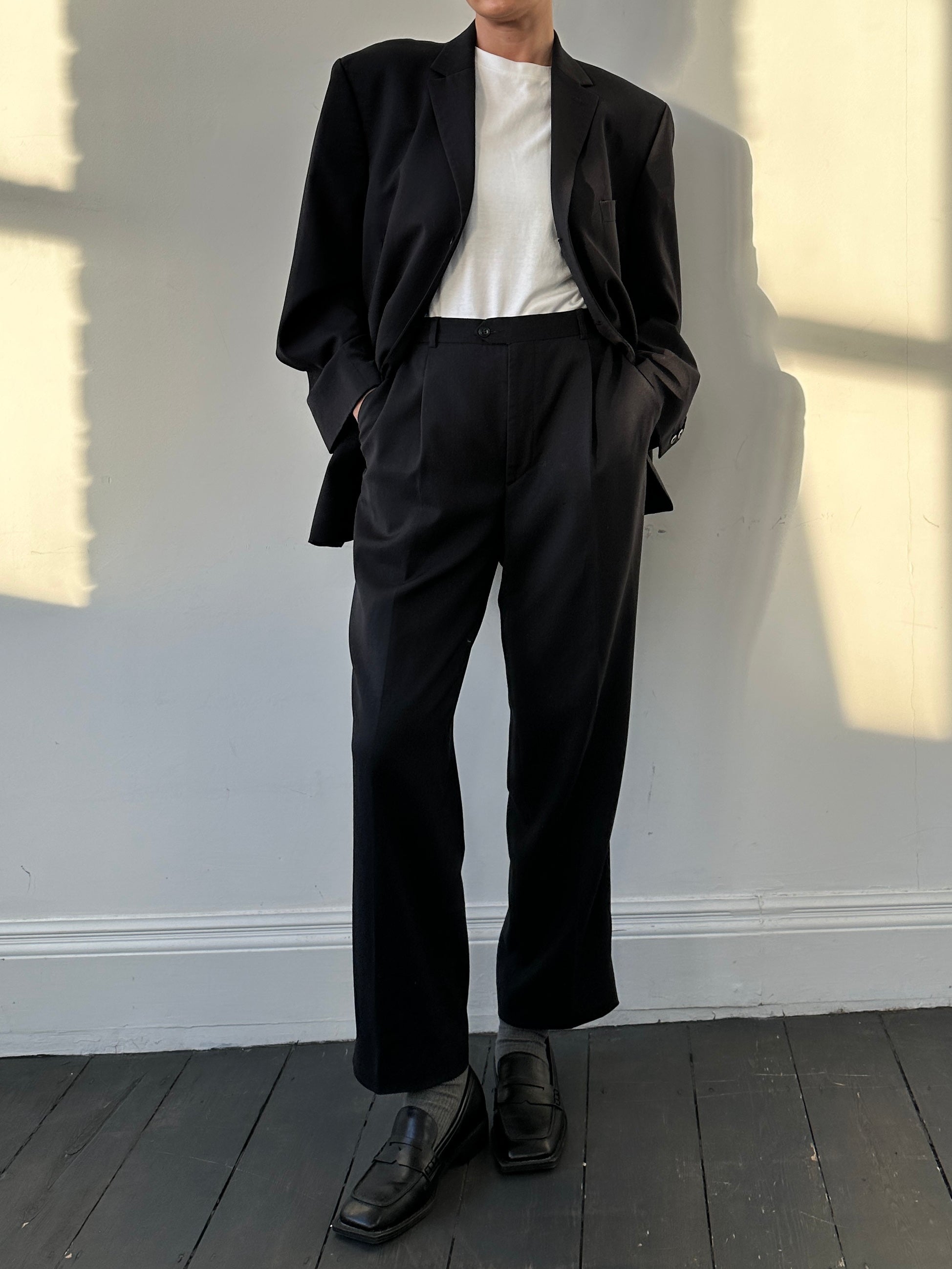Pierre Cardin pure wool single-breasted suit jumpsuit, size 44S/W32, stylish and tailored, shown on a mannequin.