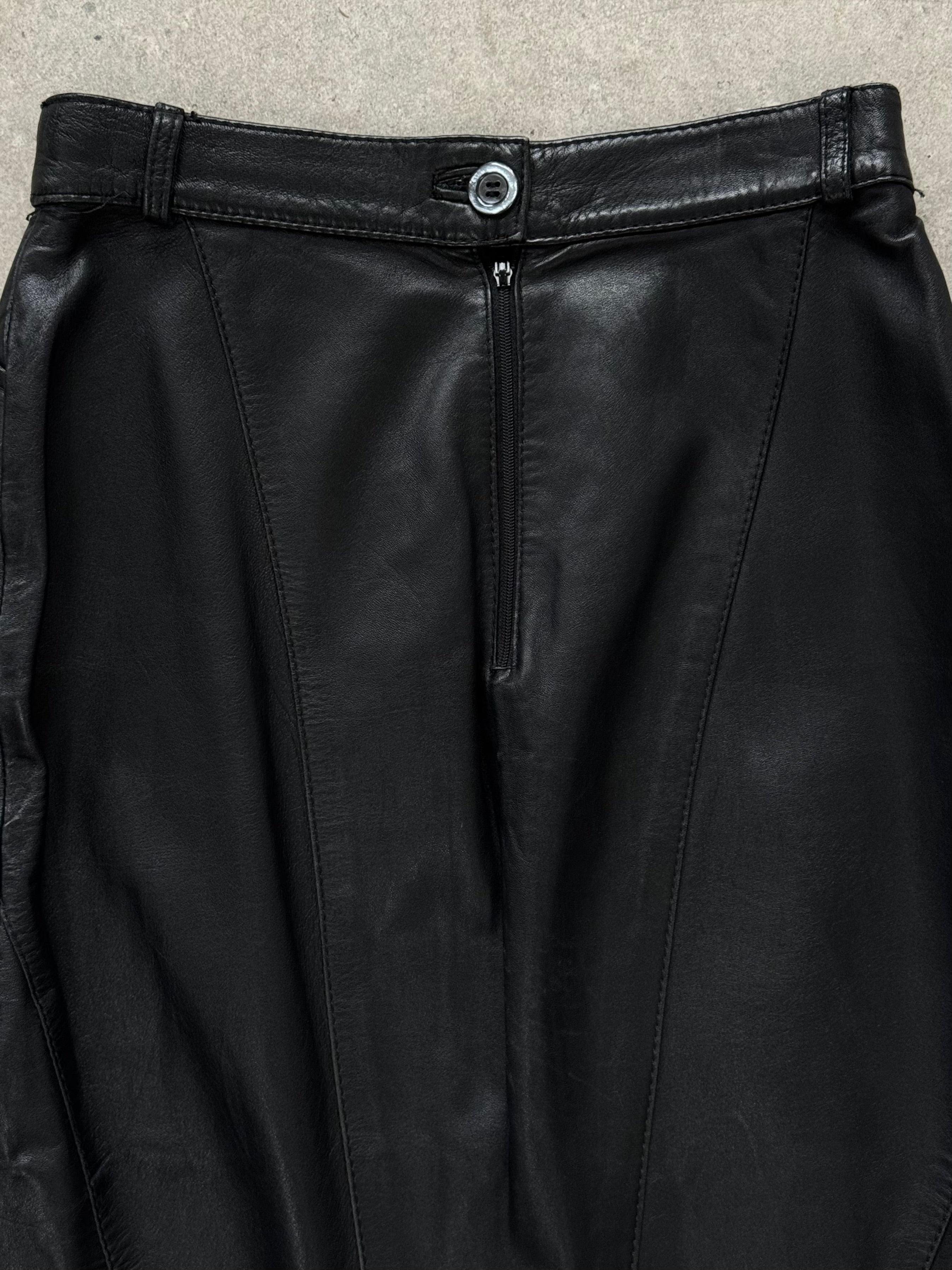 Vintage 1990s leather midi skirt, showing its classic brown leather fabric and high-waisted design on a neutral background.