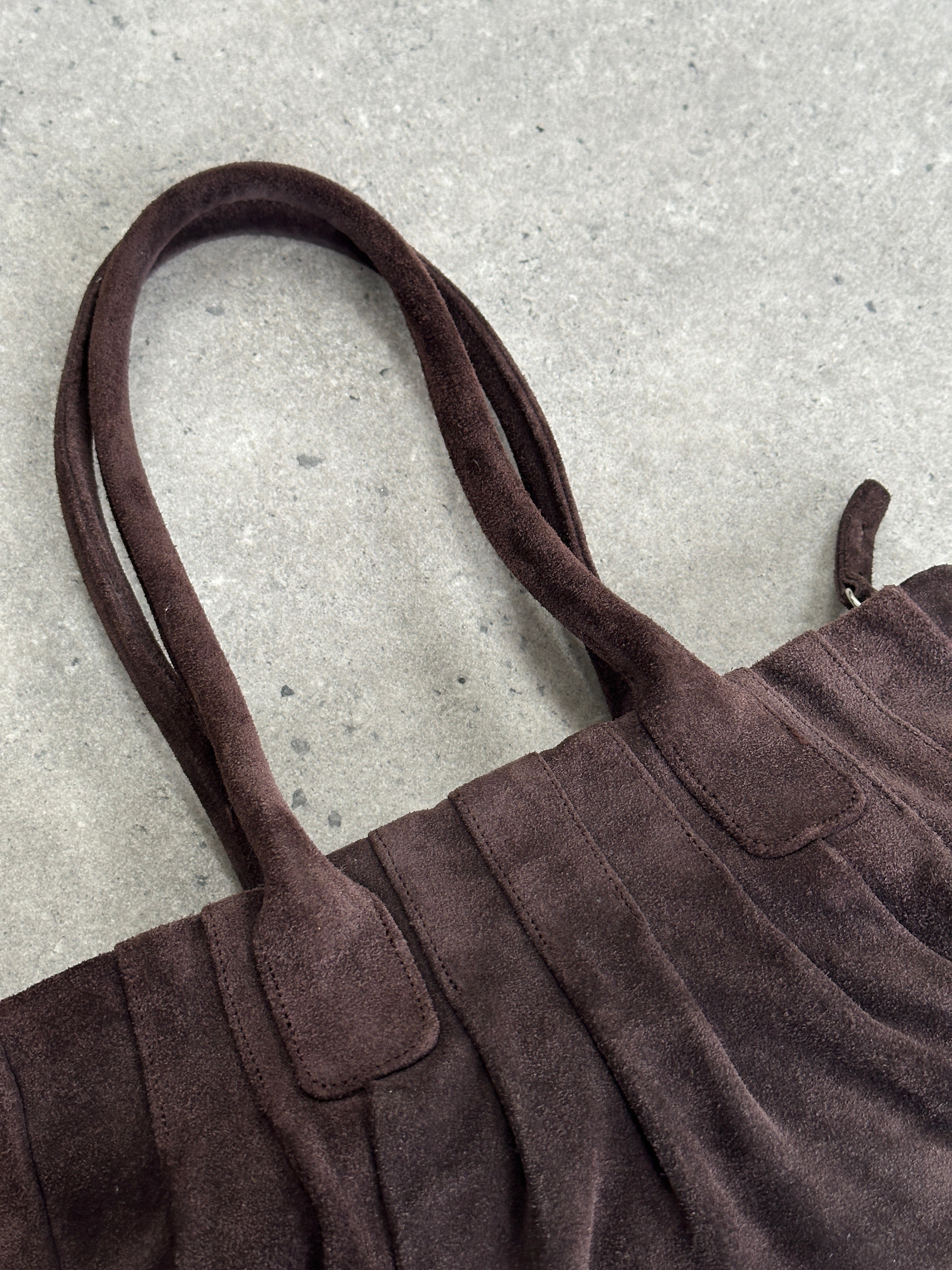 Abro Italian suede leather ruched shoulder bag with a stylish design and adjustable strap, showcasing its elegant craftsmanship.