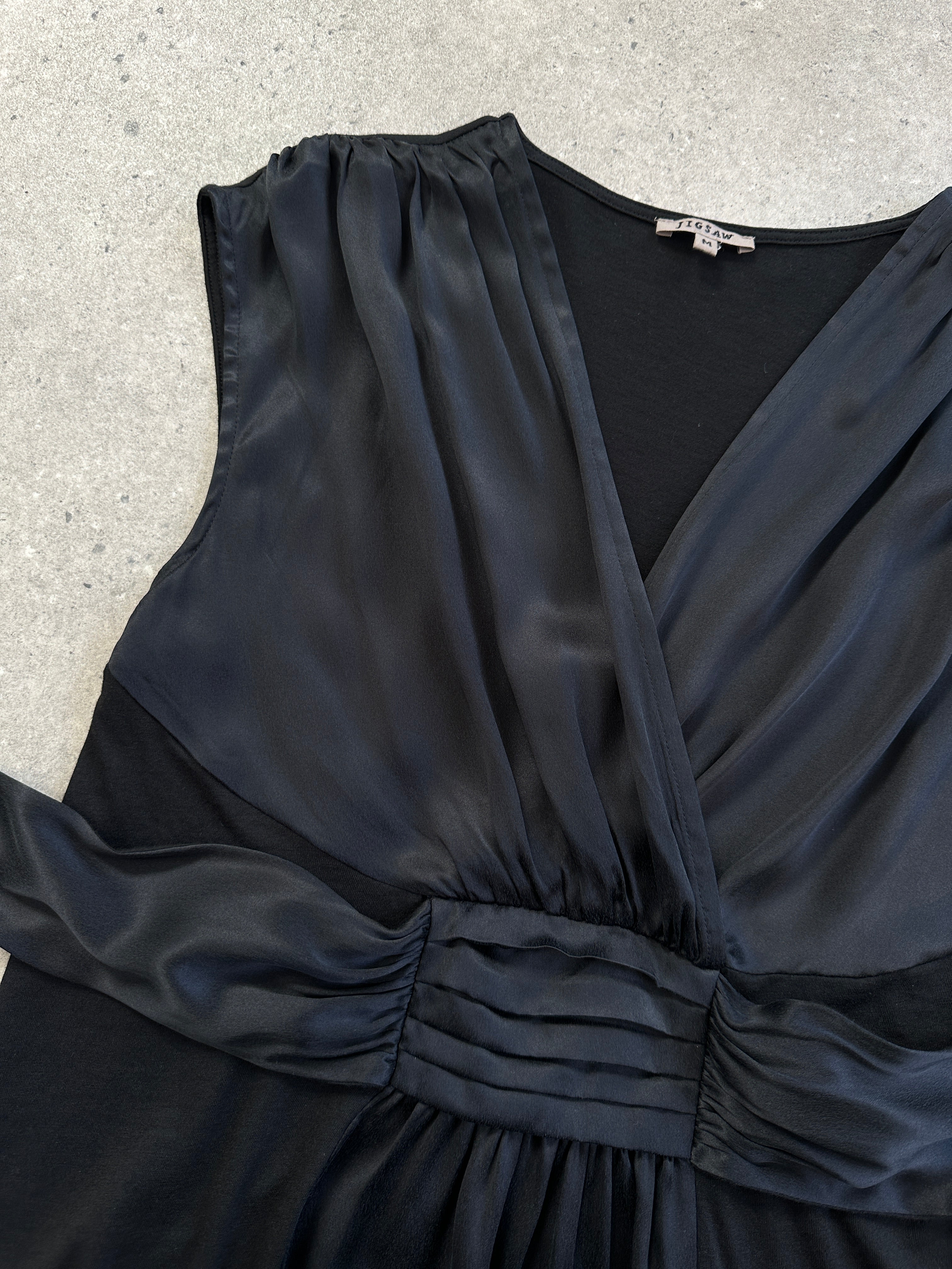 Jigsaw jigsaw silk tie vest peplum top in size M, featuring a stylish sleeveless design with a tie-front detail