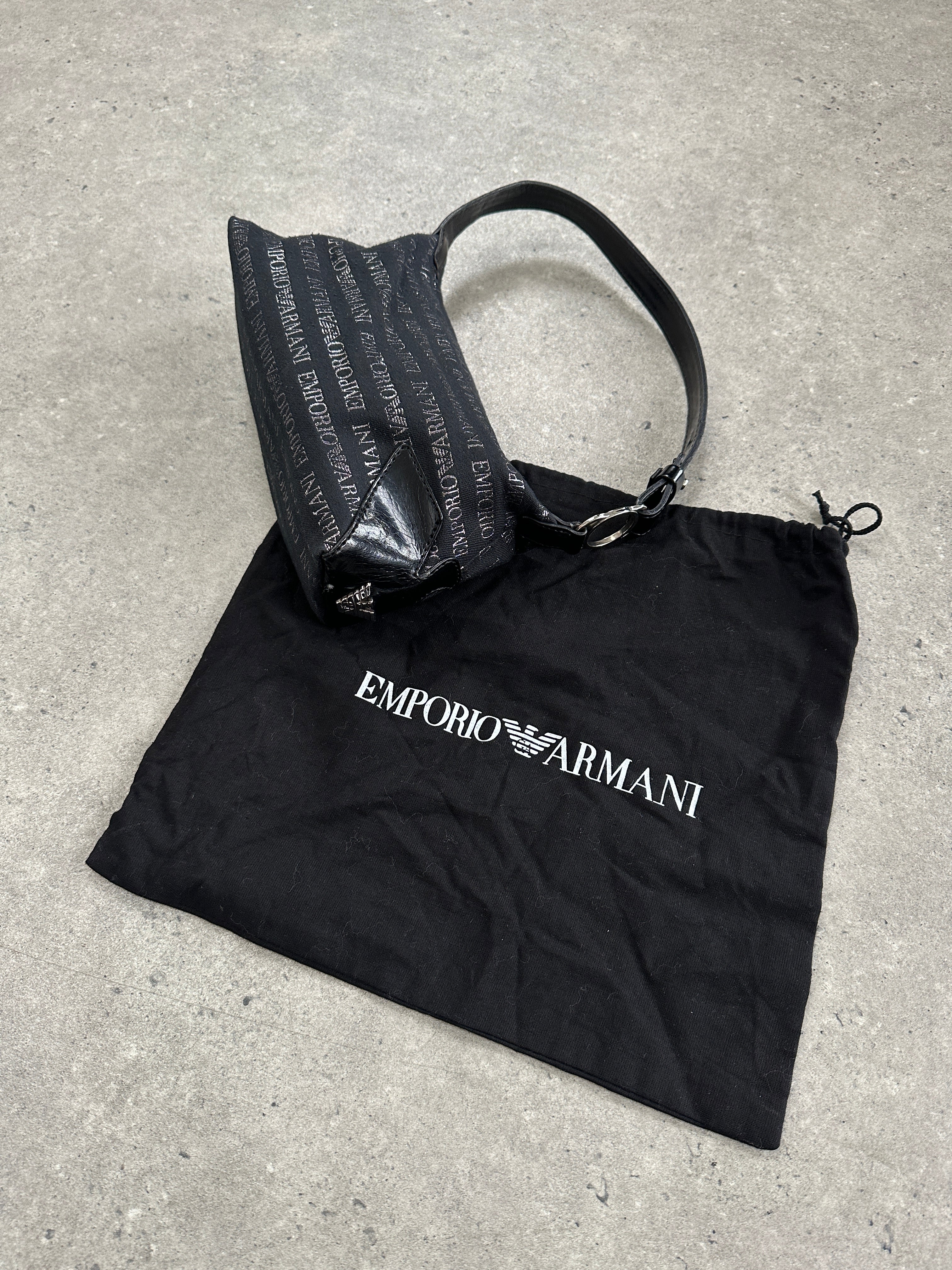 Emporio Armani Monogram Shoulder Bag with sleek design, featuring the iconic Armani monogram pattern and adjustable shoulder strap.