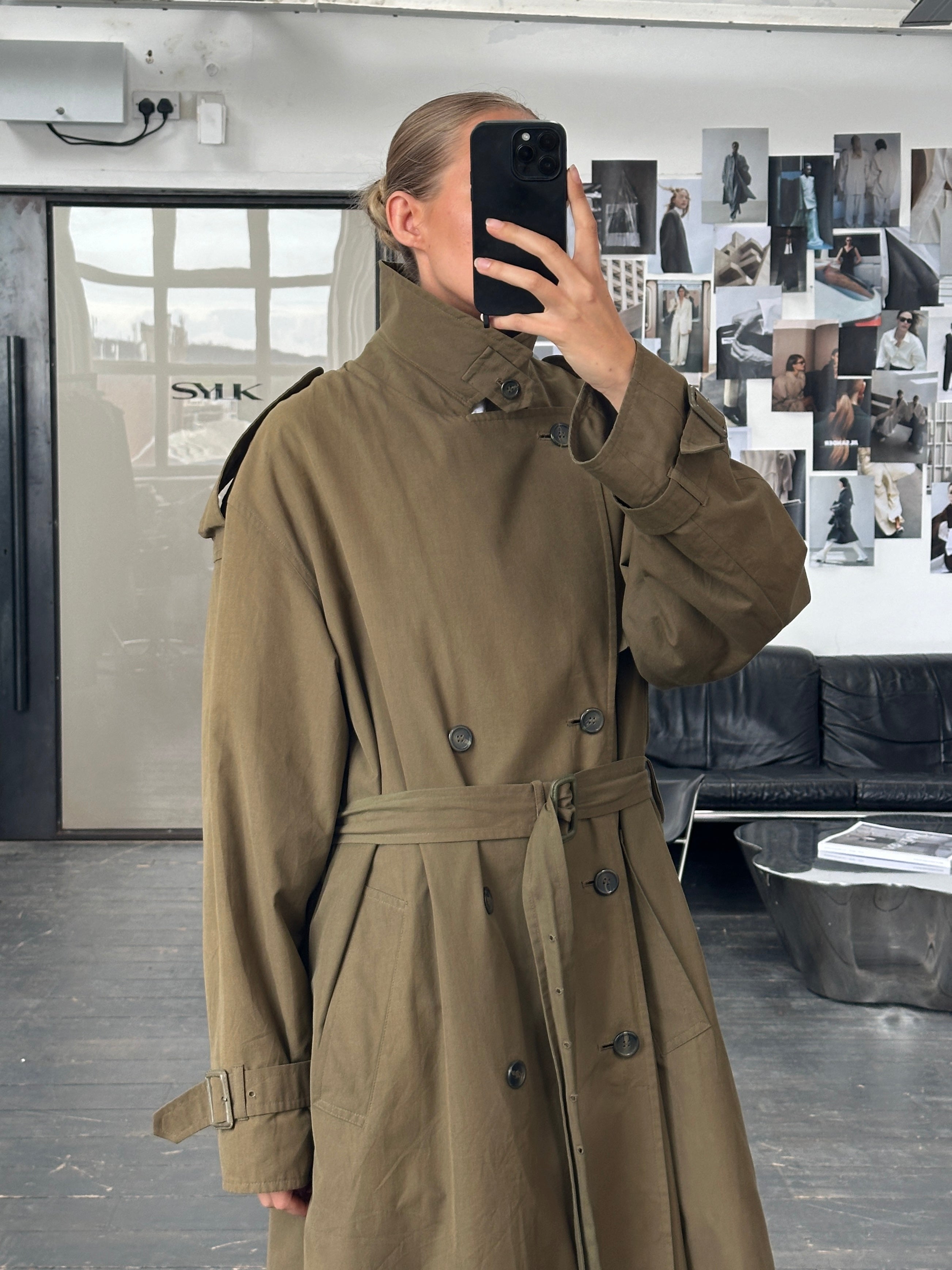 London Fog 1980s high neck belted trench coat in XXL, shown hanging with classic beige fabric and belt detail.