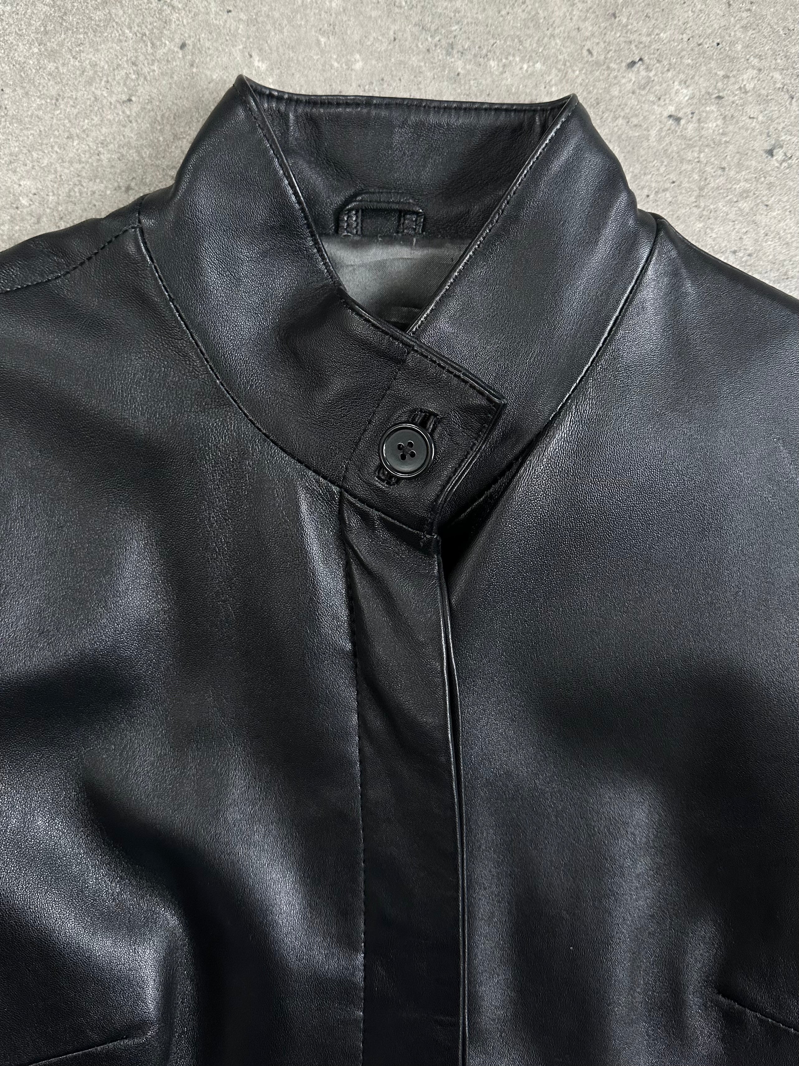 Vintage 1990s high neck leather trench coat in size small, minimal design with classic silhouette and rich leather texture.