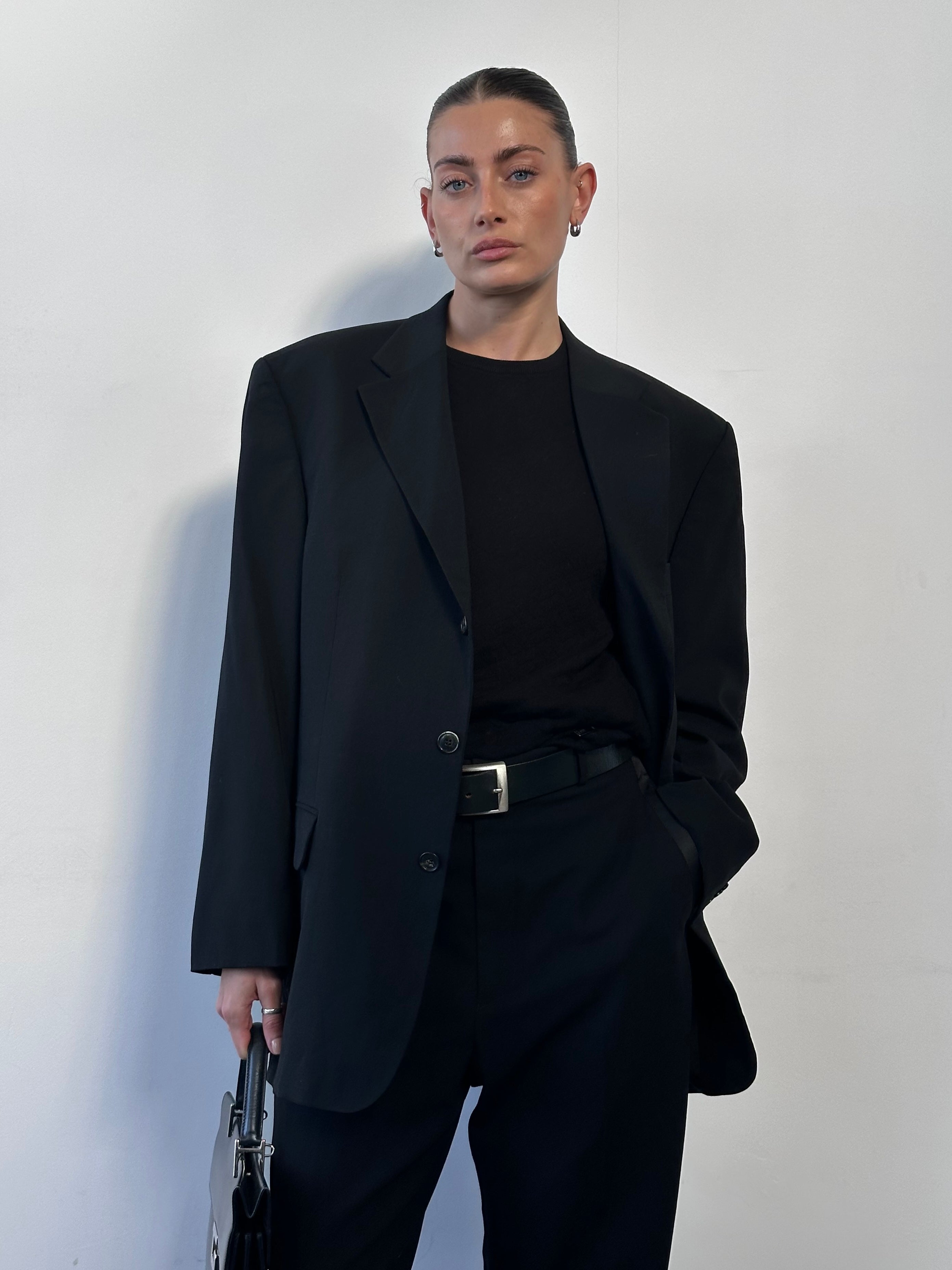 Yves Saint Laurent Pour Homme pure wool single-breasted blazer in size 40R/L, shown in a tailored fit with classic lapels.