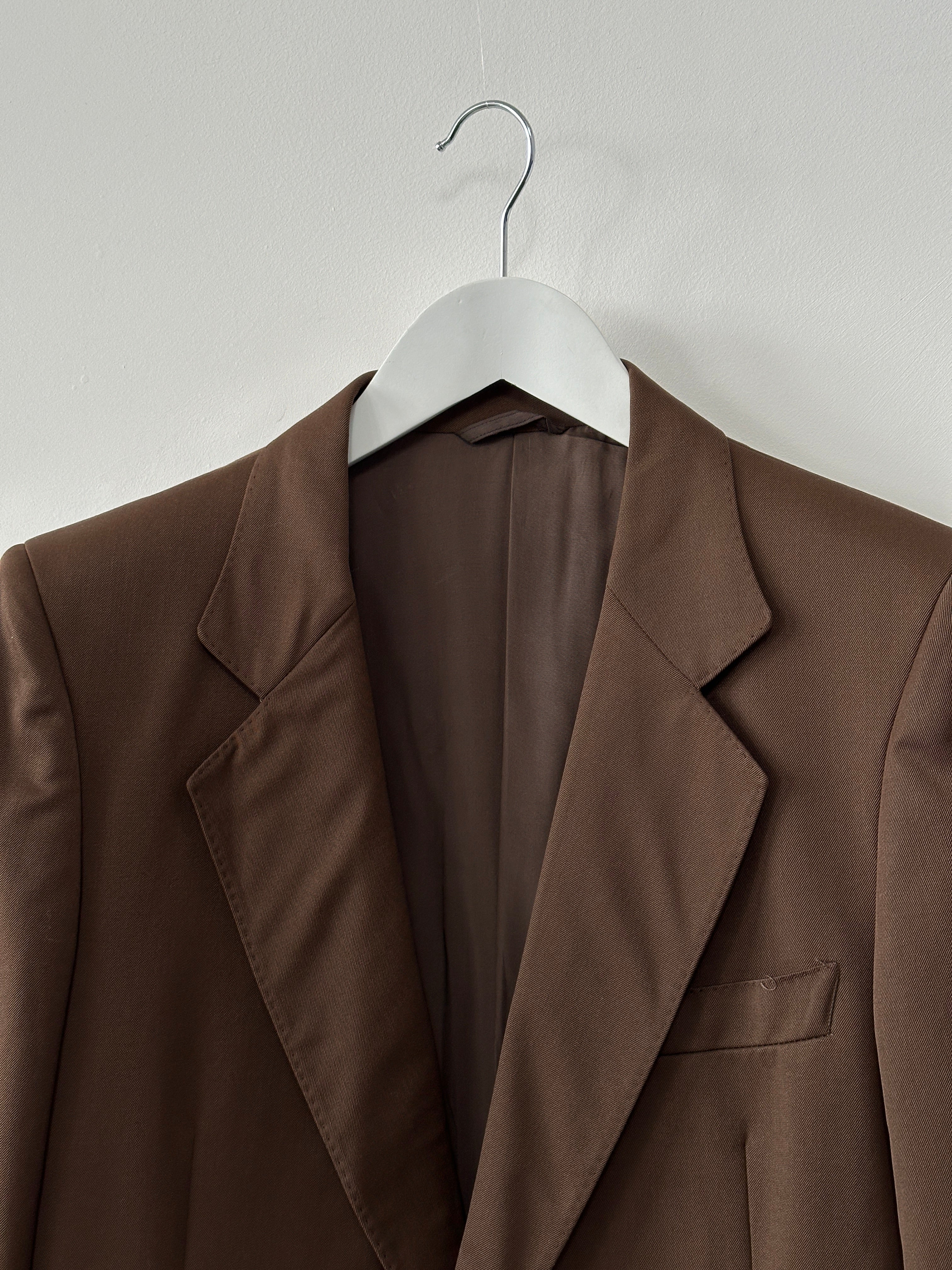 Vintage Italian vintage pure wool single-breasted blazer in size small/medium, classic tailored design with lapel collar.