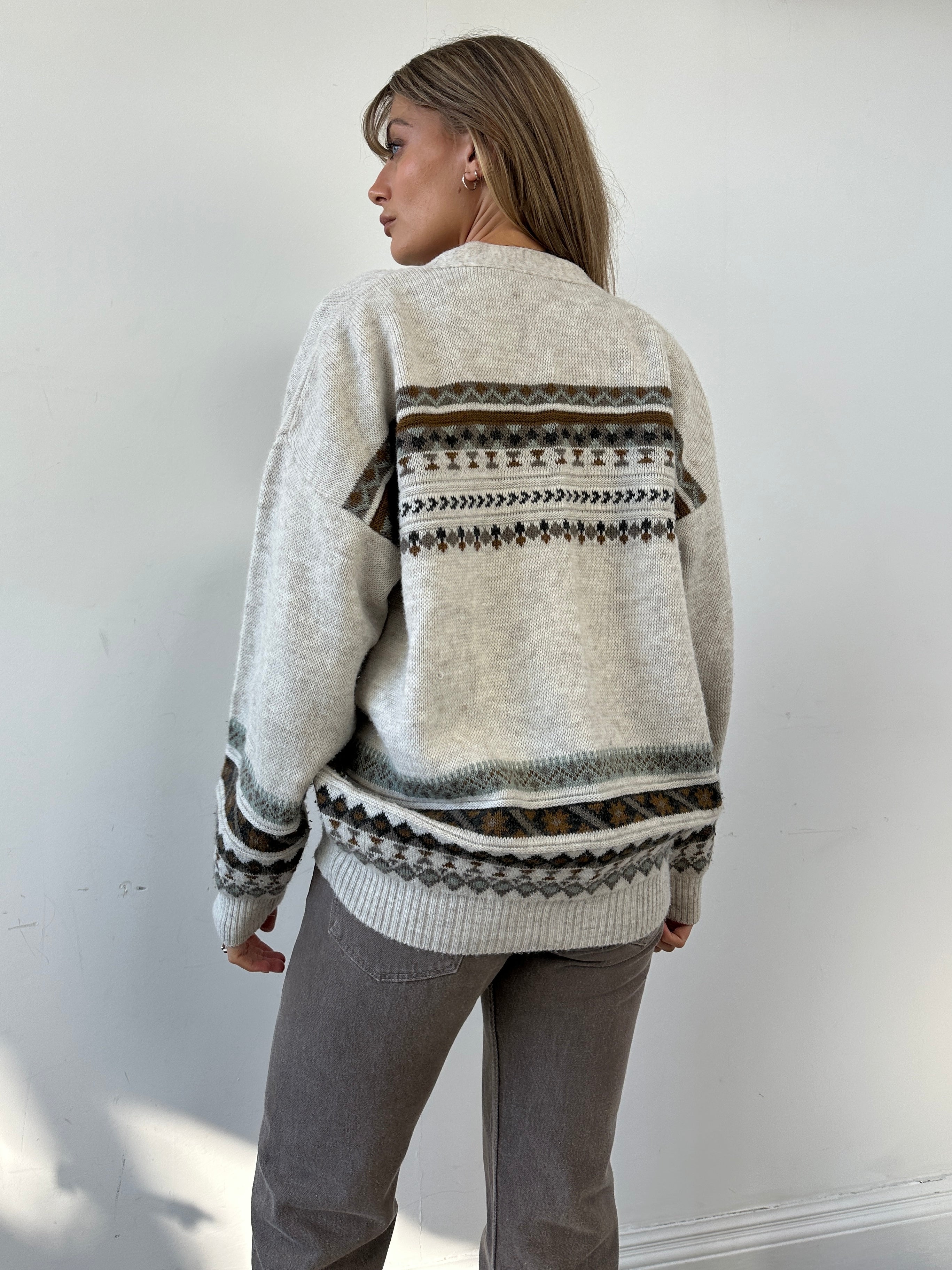 Vintage Italian vintage wool print cardigan in size M/L, featuring a classic pattern and cozy knit texture.
