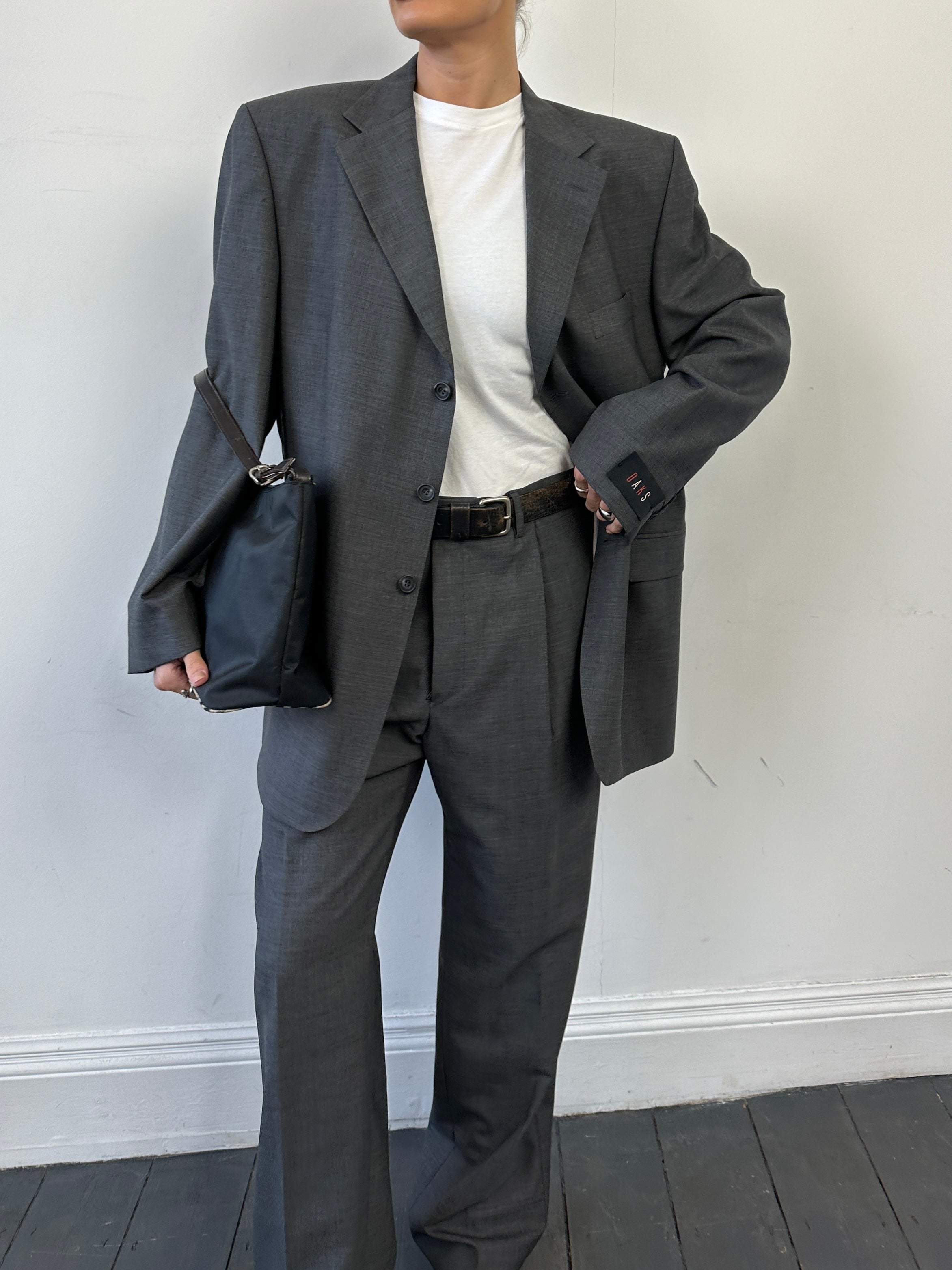 Vintage pure wool single-breasted suit jumpsuit in size 44R/W36, featuring classic tailored design and structured fit.