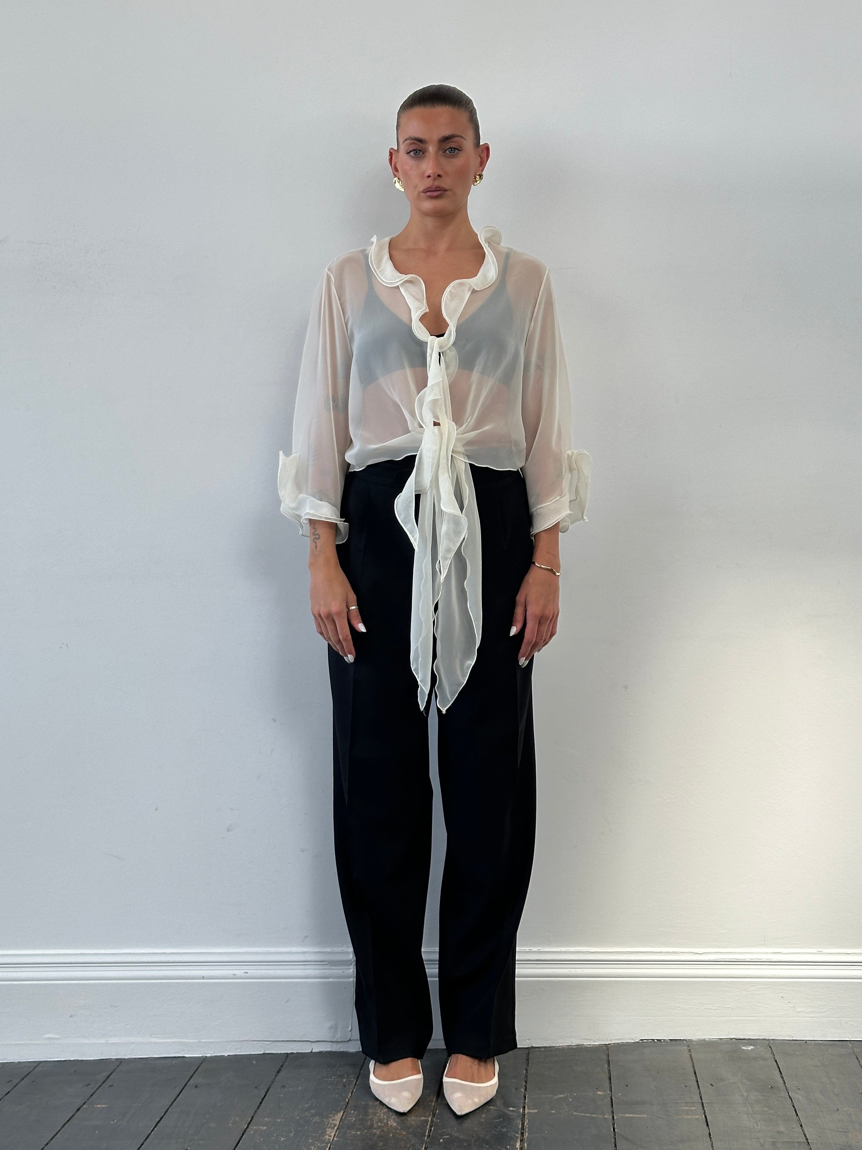 Vintage Italian sheer frill tie-front blouse in size S-XL, featuring delicate ruffles and a classic shirt design.