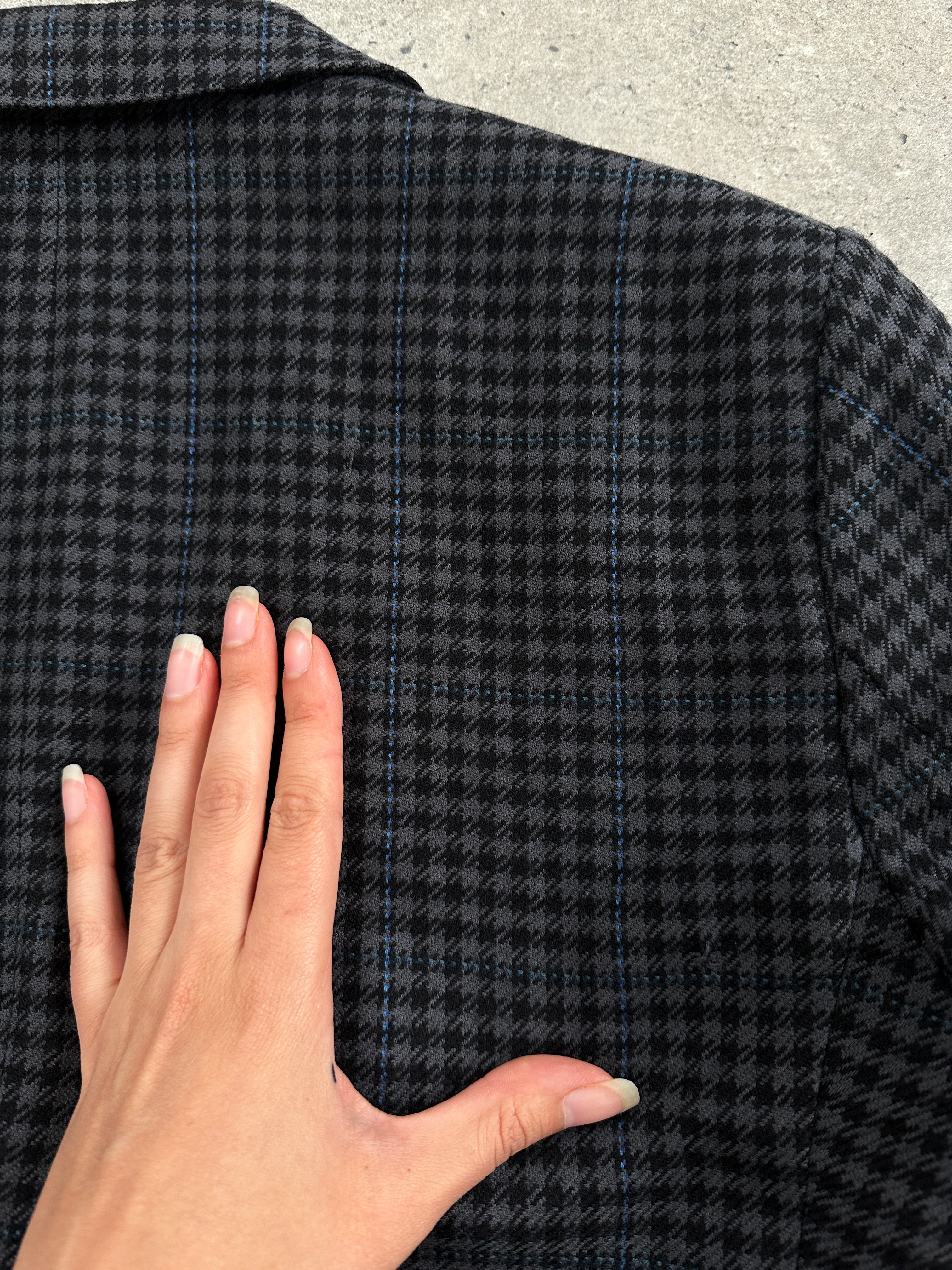 Yves Saint Laurent 1980s check brushed wool blazer in size 40R/L, featuring classic plaid pattern and tailored fit.
