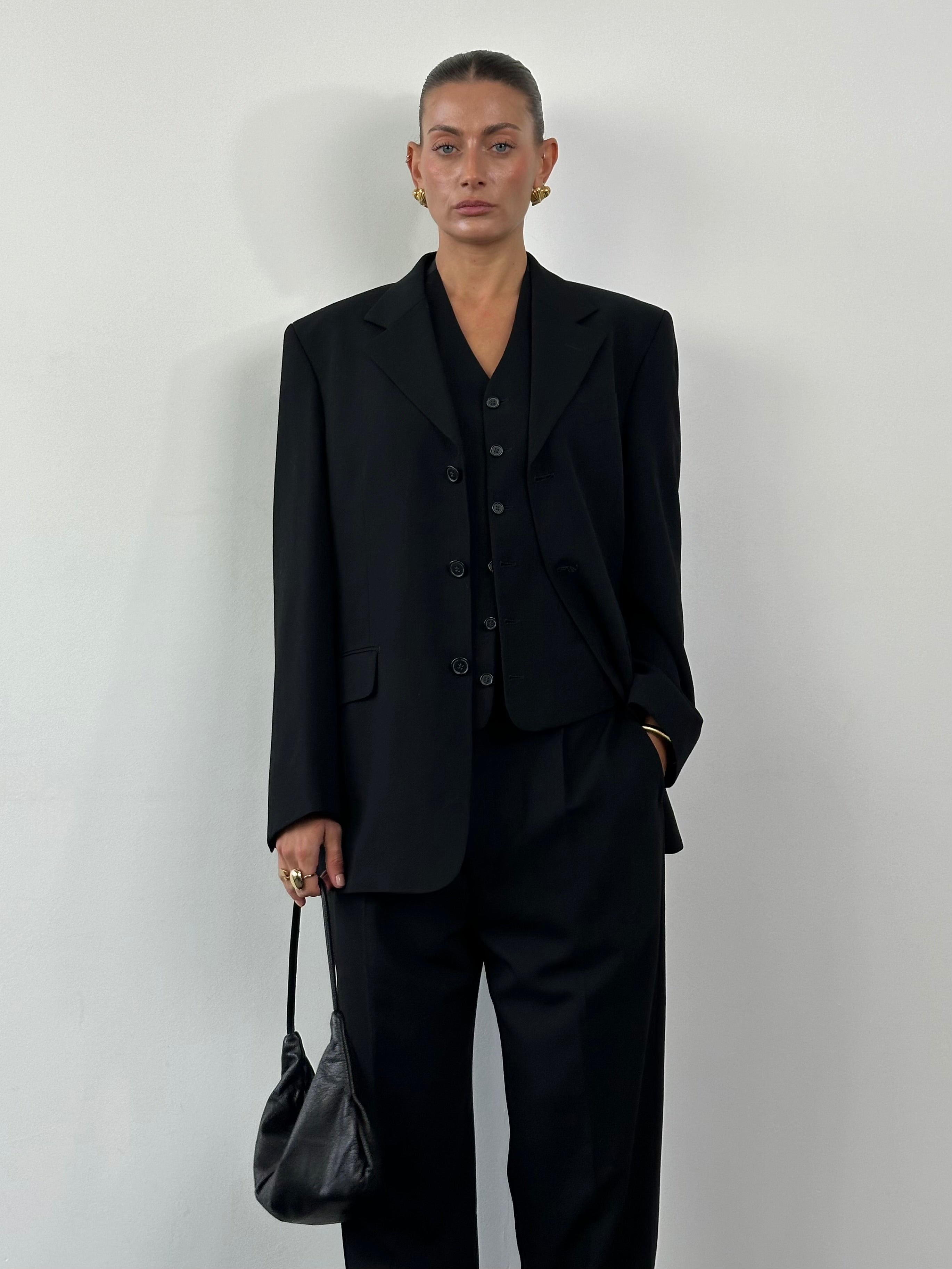 Yves Saint Laurent Pour Homme 1990s pure wool three-piece suit in size 40R/W32, featuring a tailored jacket, vest, and trousers.