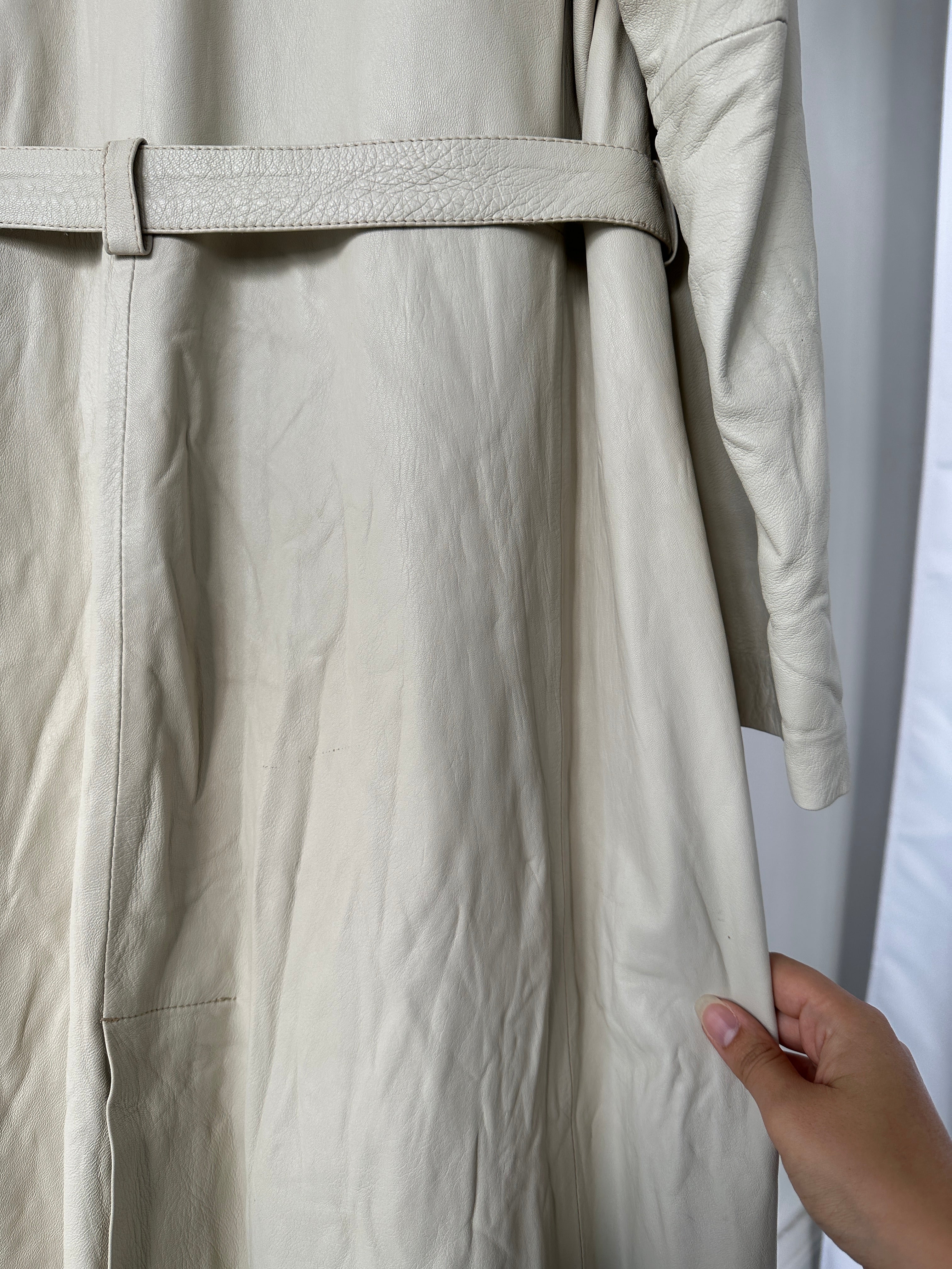 Vintage belted leather trench coat jacket in size M, featuring classic design with a waist belt and structured collar.